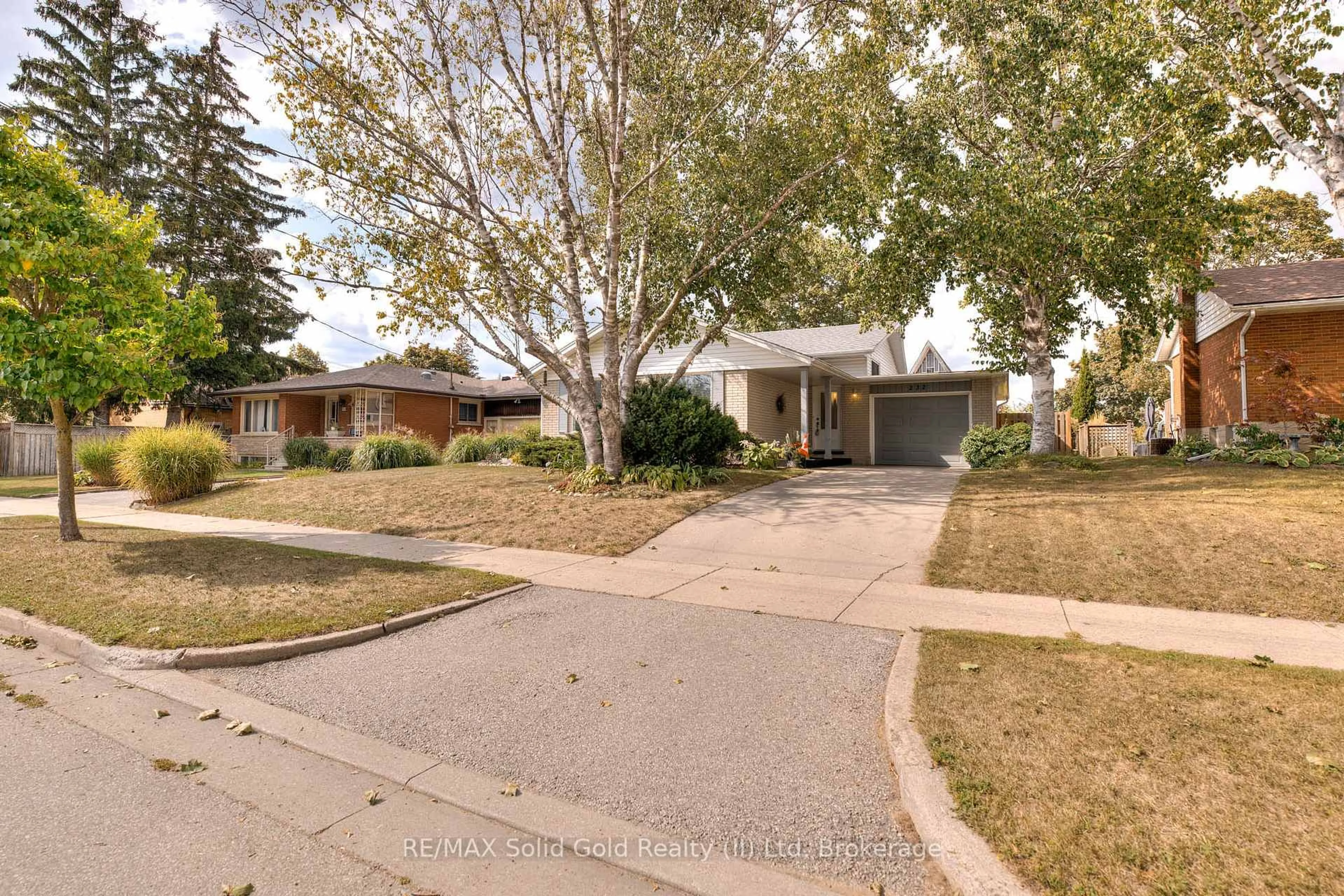 Home with brick exterior material, street for 232 Kenneth Ave, Kitchener Ontario N2A 1W4
