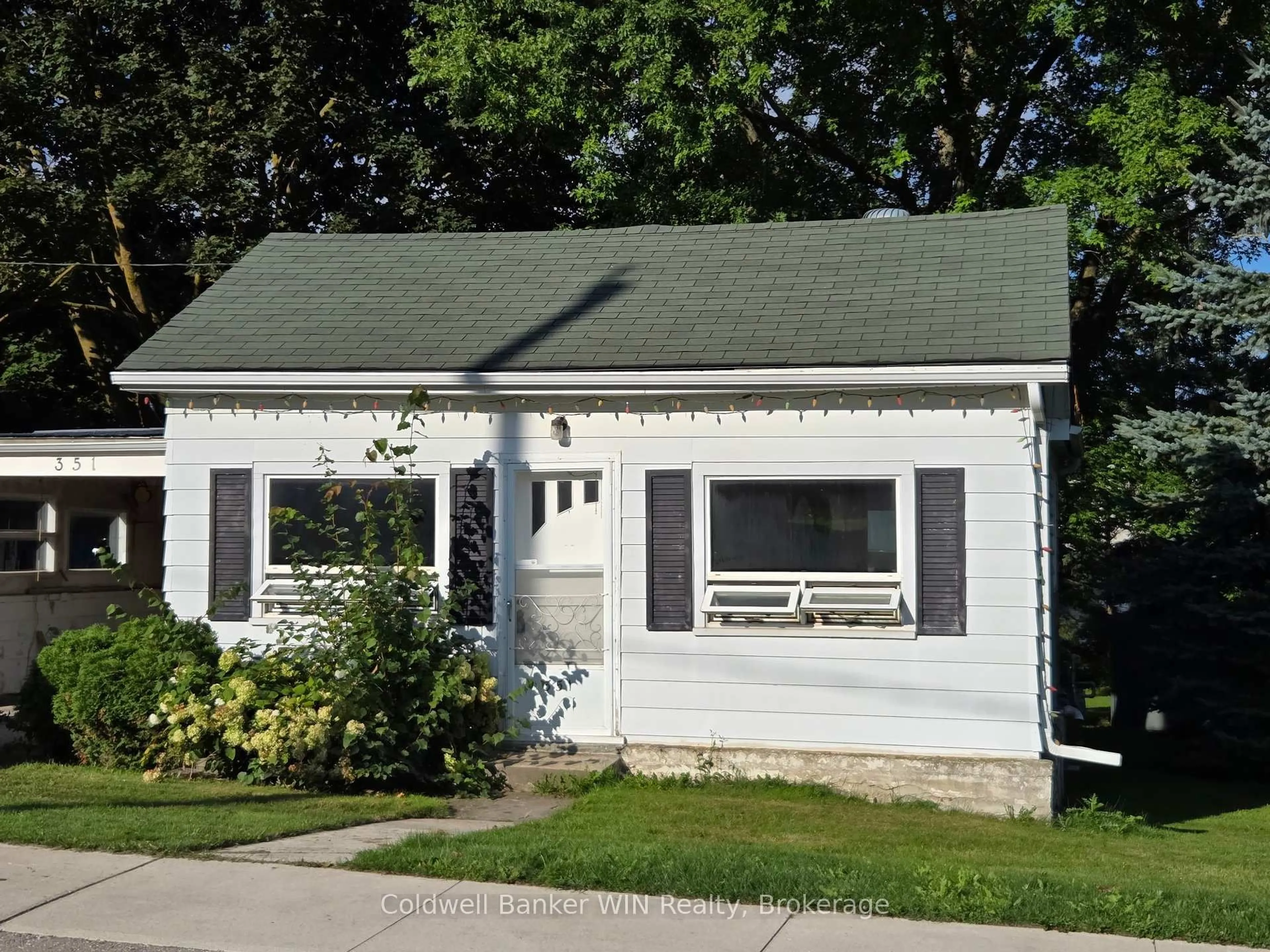 Home with vinyl exterior material, street for 351 William St, Wellington North Ontario N0G 2L3