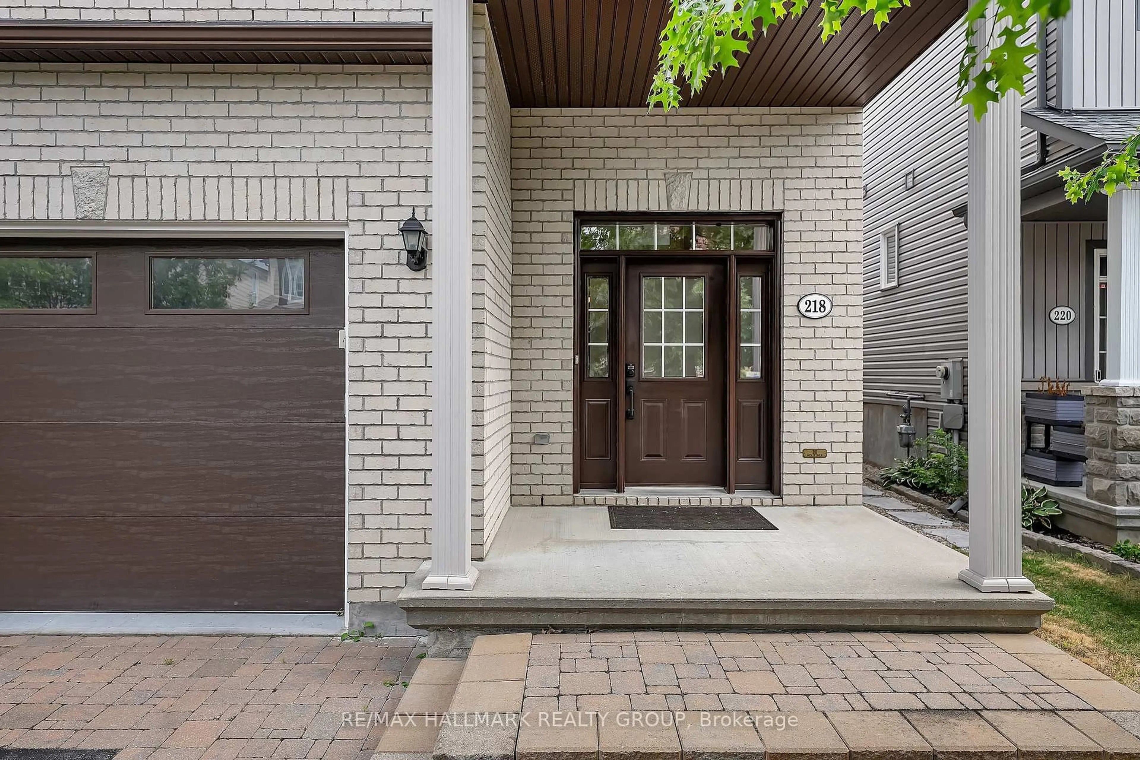 Home with brick exterior material, street for 218 Harthill Way, Ottawa Ontario K2J 0P2