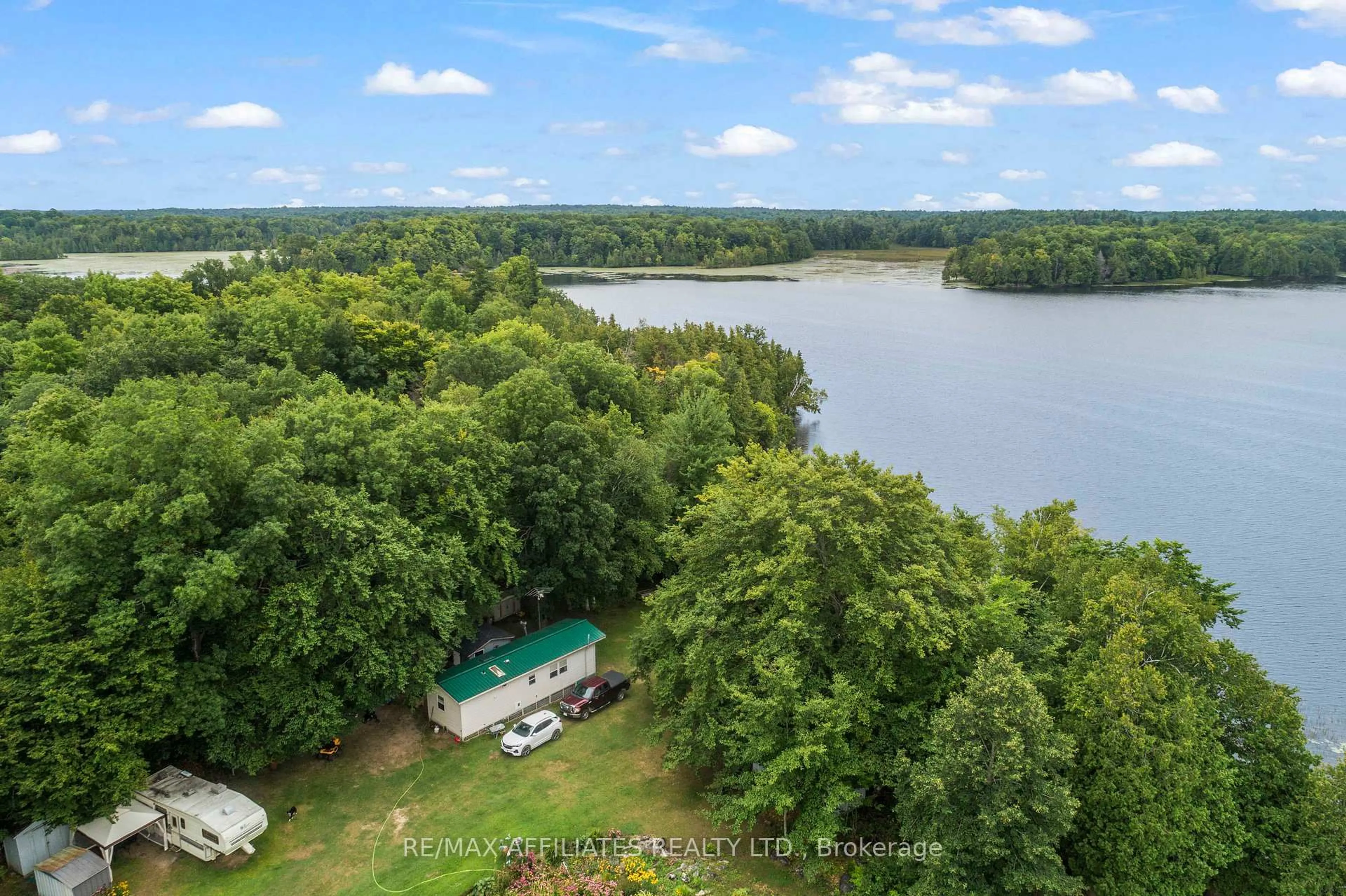 A pic from outside/outdoor area/front of a property/back of a property/a pic from drone, water/lake/river/ocean view for 141 Brady Rd, Rideau Lakes Ontario K0G 1X0