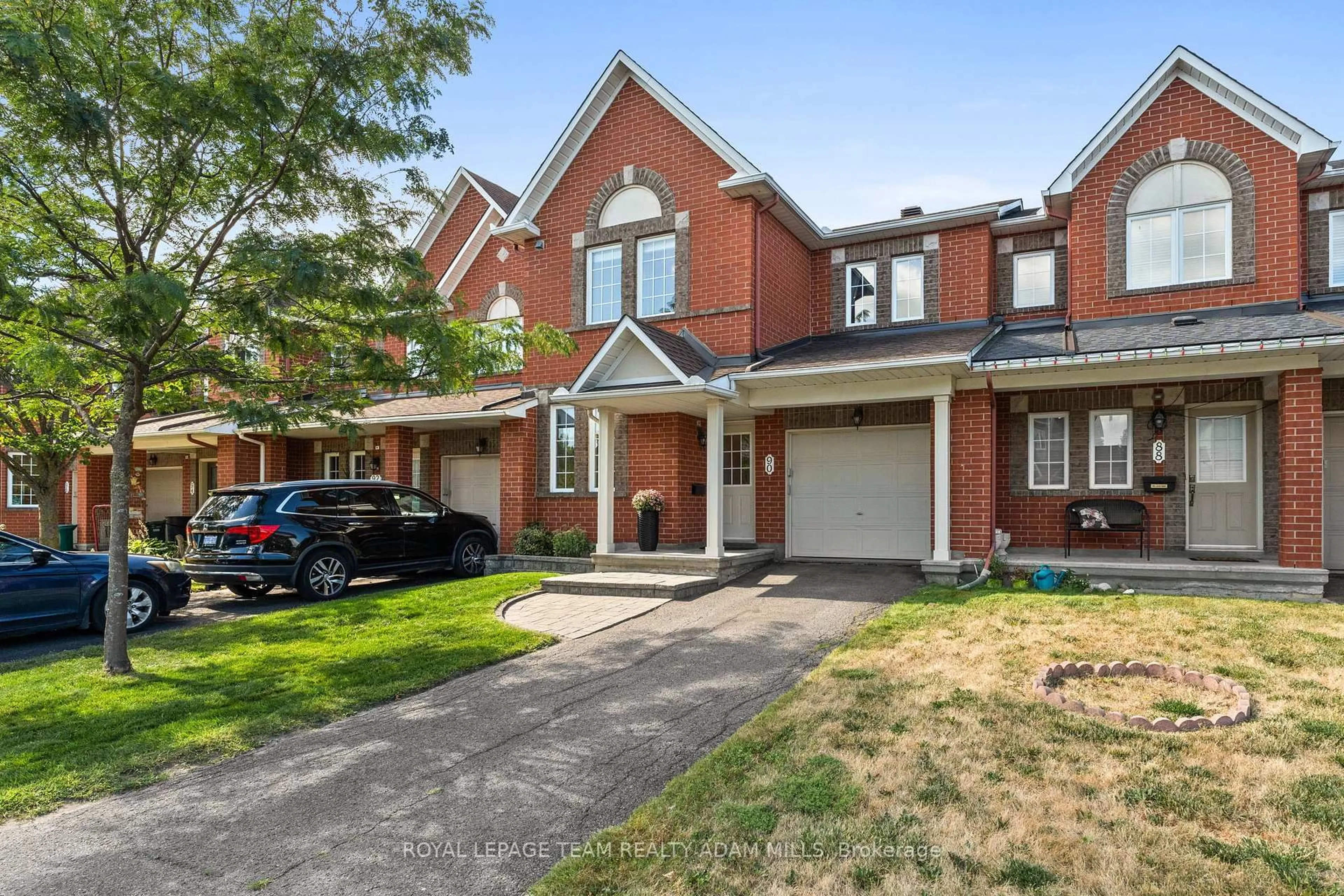 Home with brick exterior material, street for 90 Hathaway Dr, Ottawa Ontario K2G 6S6