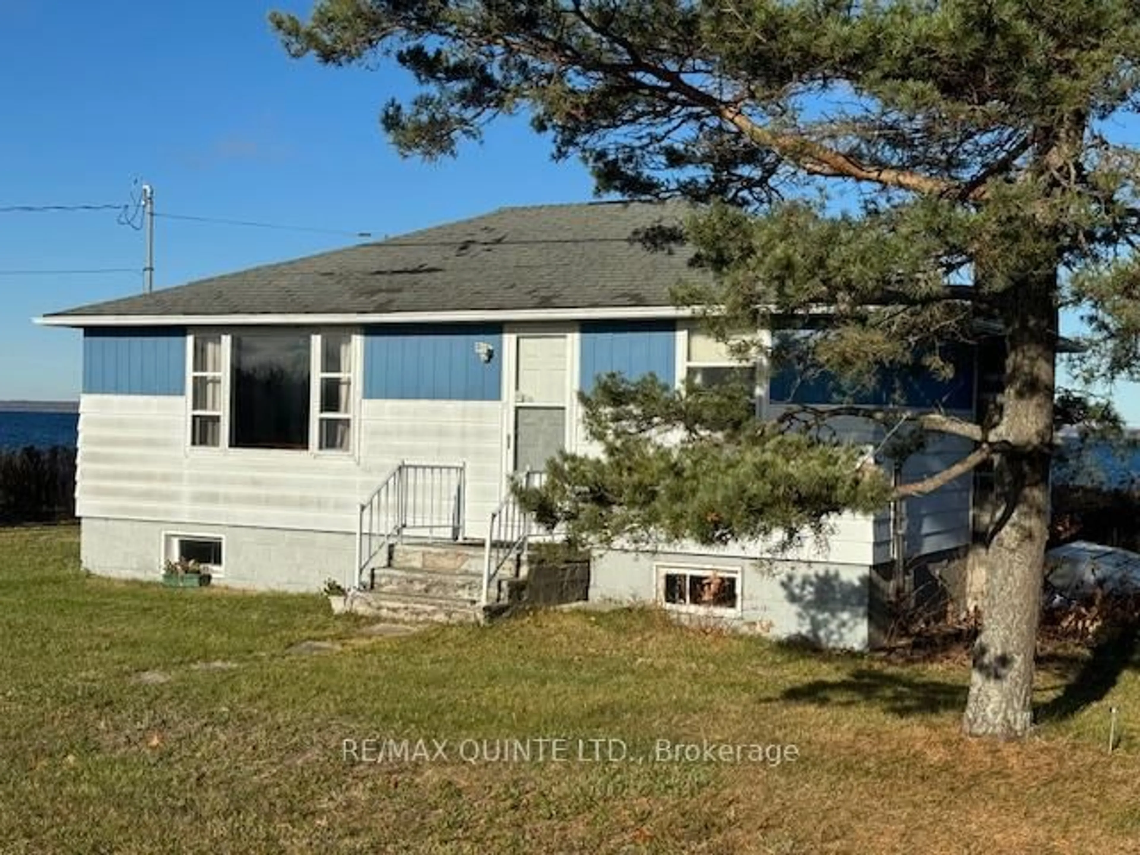 Home with vinyl exterior material, water/lake/river/ocean view for 5083 Long Point Rd, Prince Edward County Ontario K0K 2T0