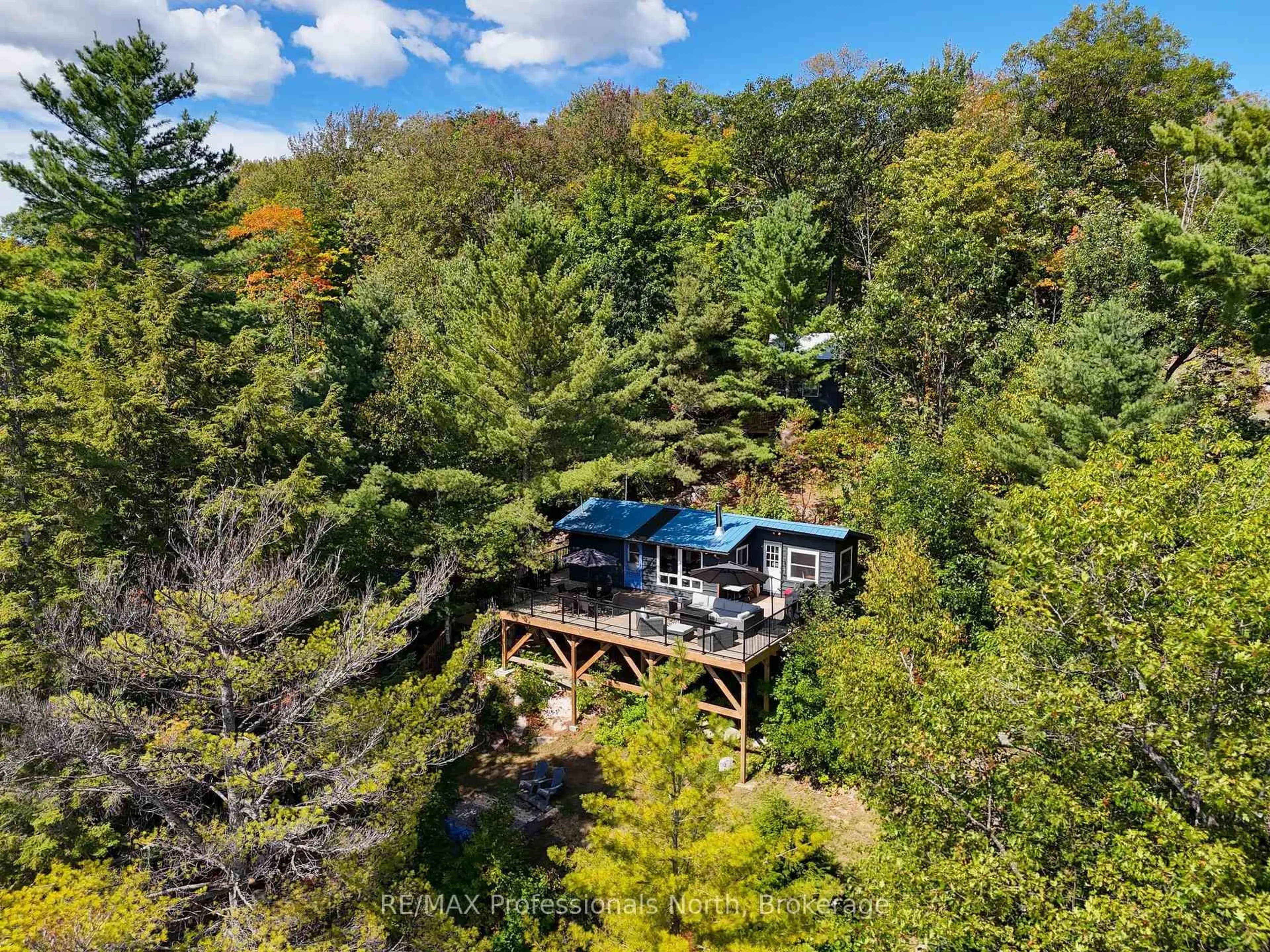 A pic from outside/outdoor area/front of a property/back of a property/a pic from drone, forest/trees view for 154A Pike Rd, Parry Sound Remote Area Ontario P0A 1X0