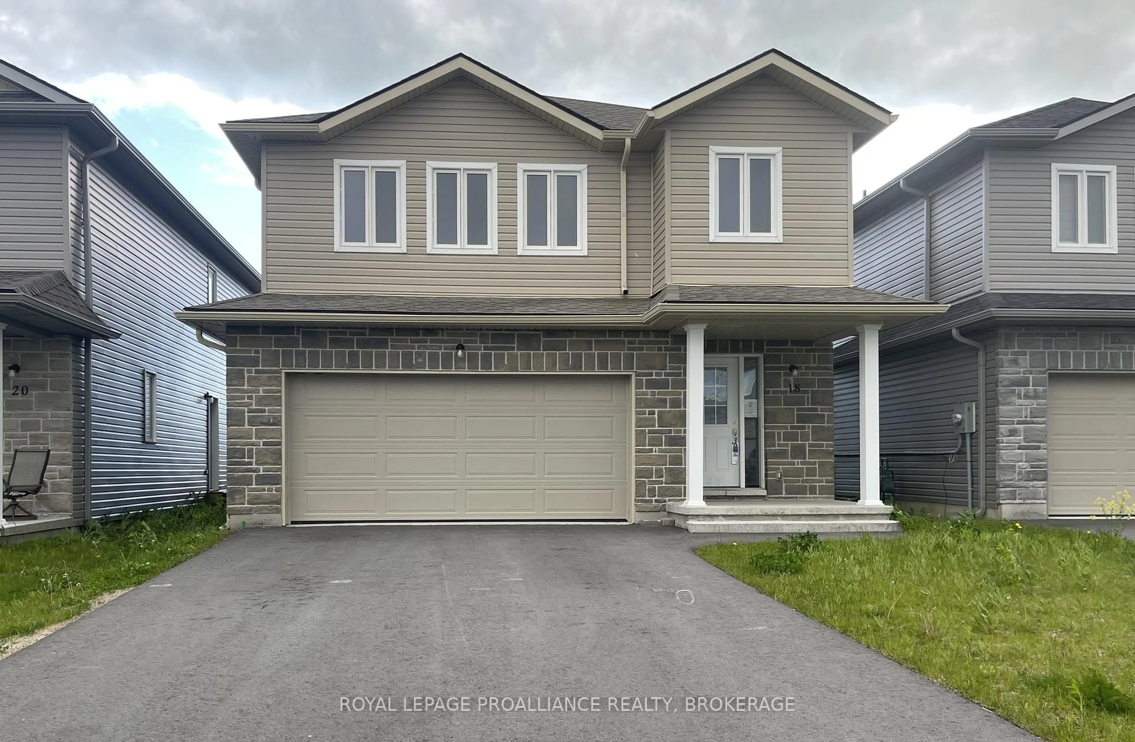 Home with vinyl exterior material, street for 18 Millcreek Dr, Bissett Creek Ontario K0H 2H0