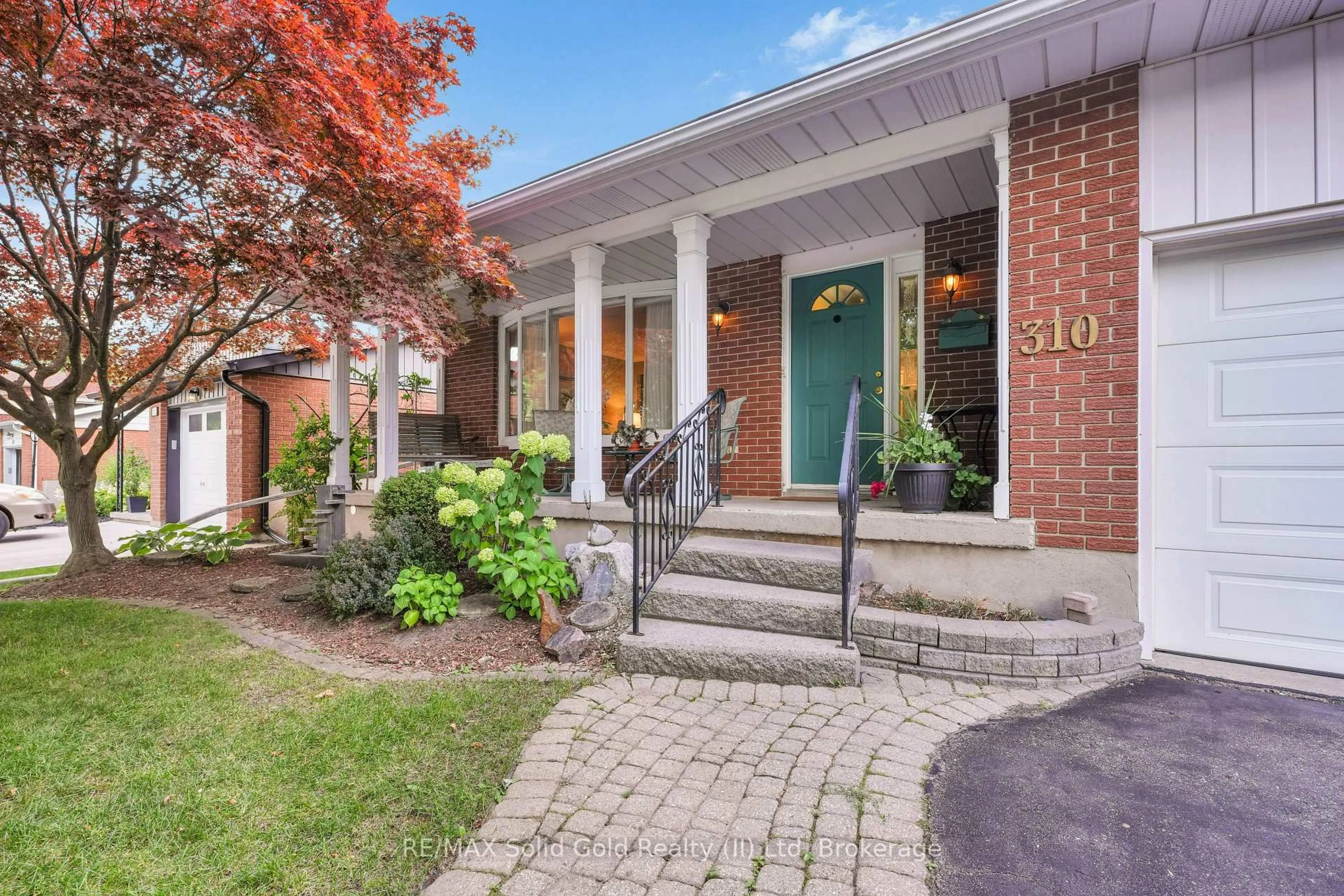 Home with brick exterior material, street for 310 Daleside Pl, Waterloo Ontario N2L 5M4