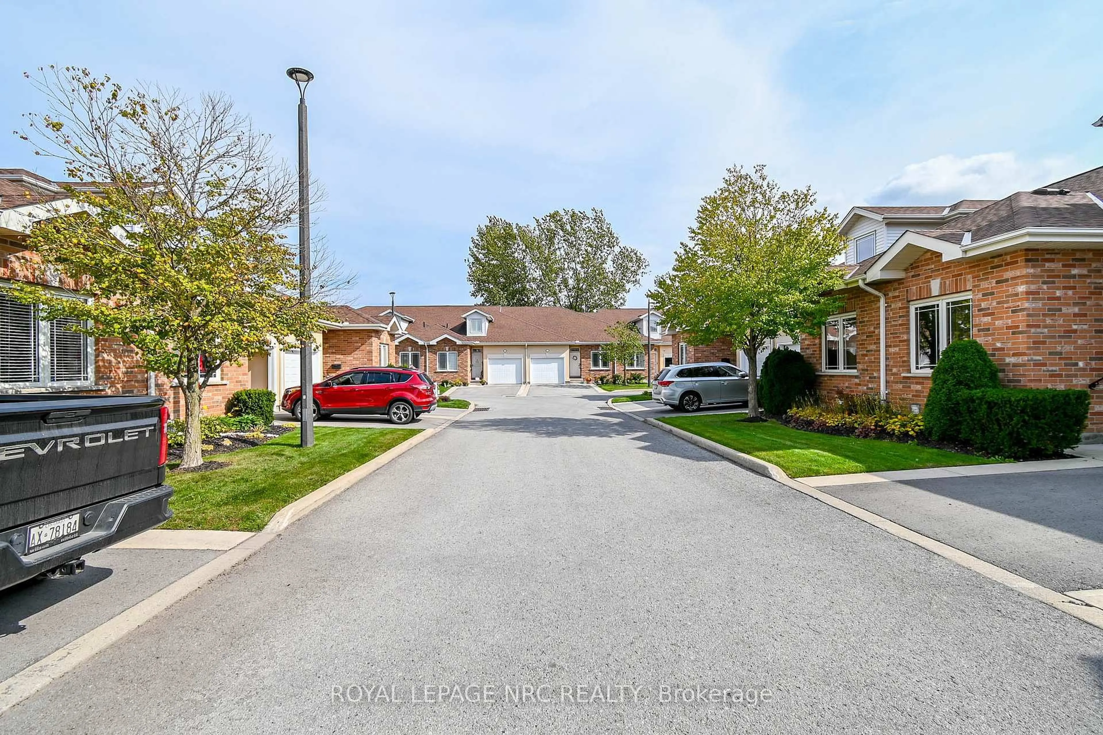 A pic from outside/outdoor area/front of a property/back of a property/a pic from drone, street for 4300 Kalar Rd #15, Niagara Falls Ontario L2H 1S8