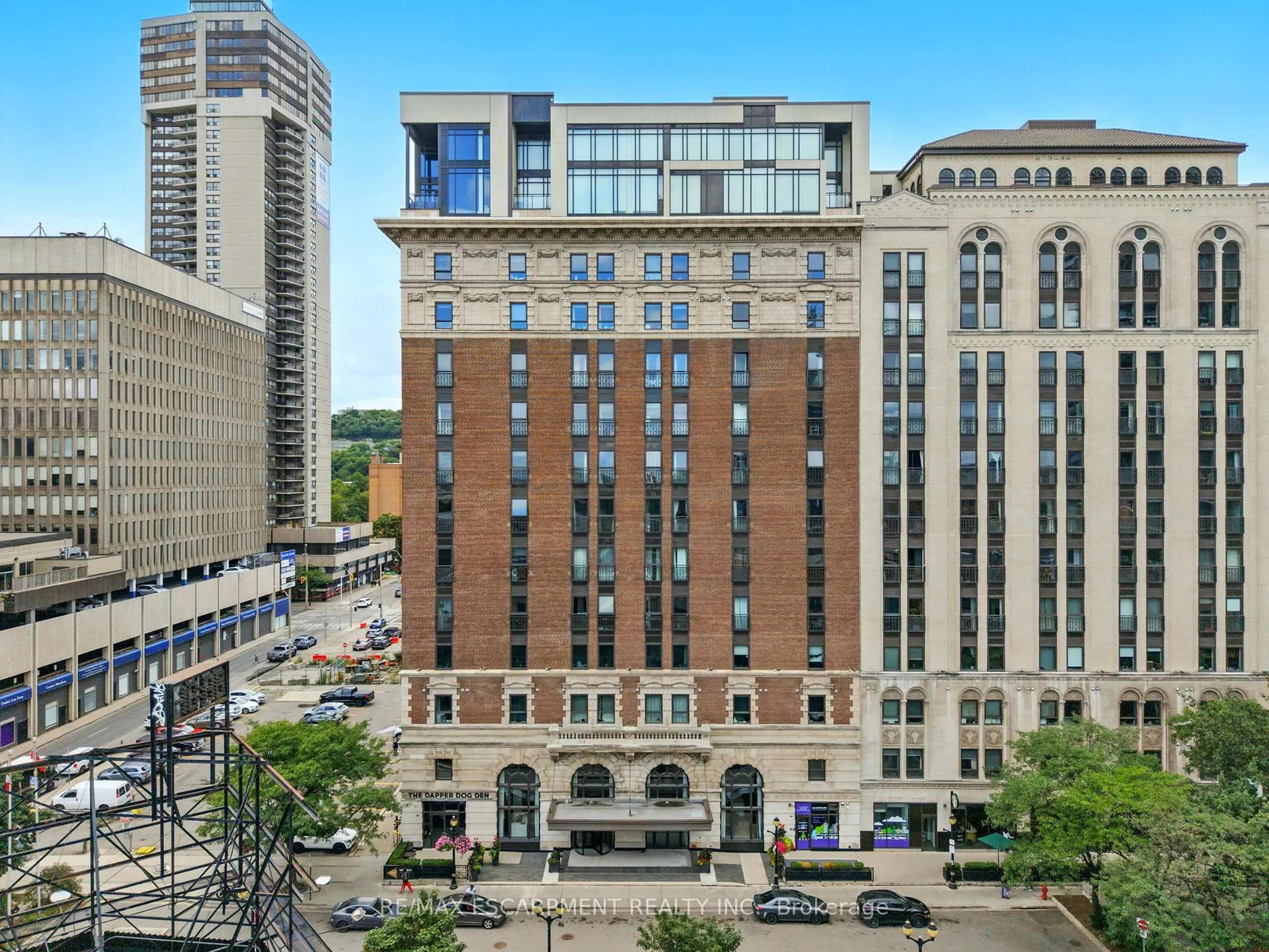 Patio, city buildings view from balcony for 118 King St #523, Hamilton Ontario L8N 0A9
