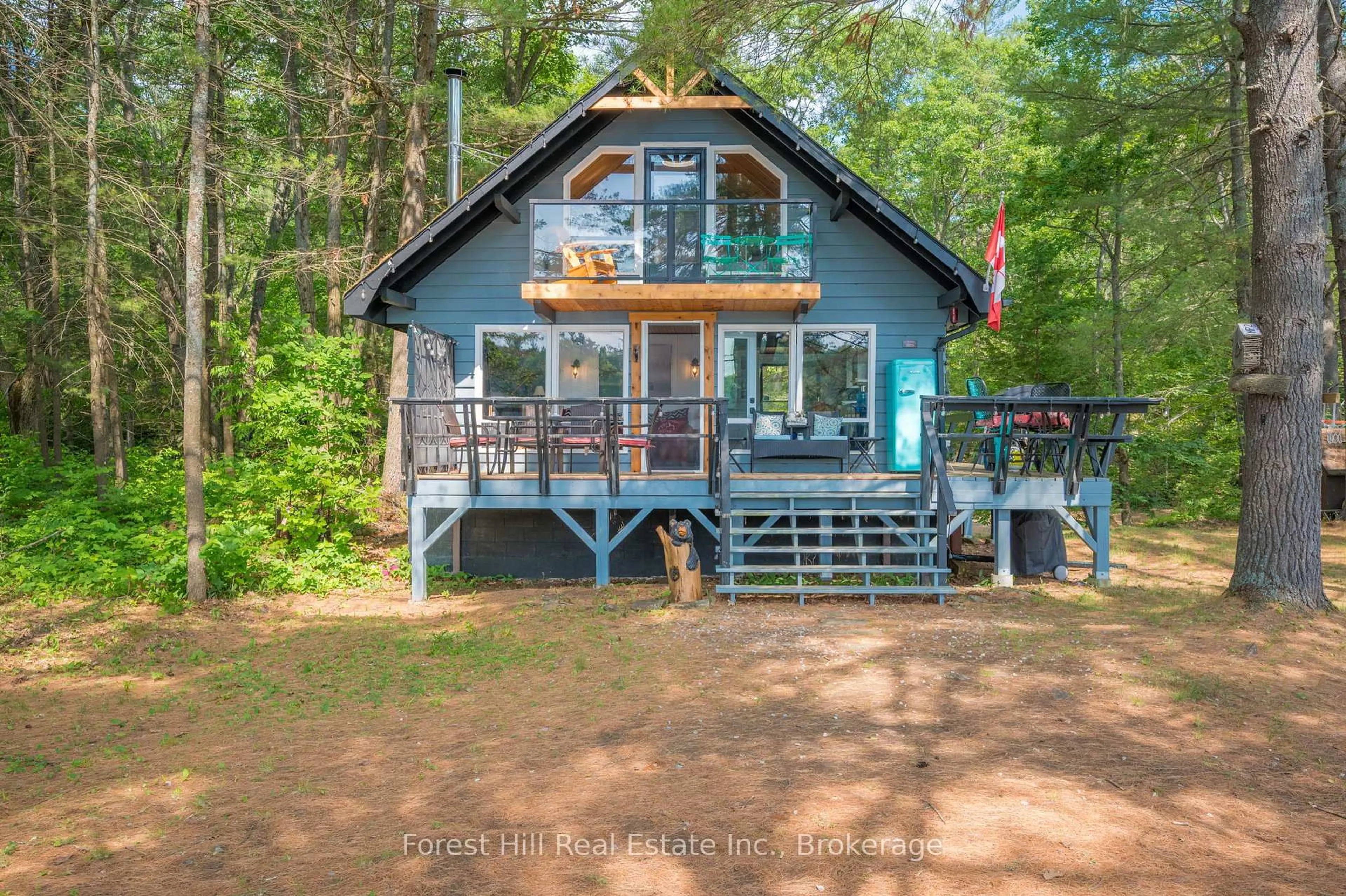 A pic from outside/outdoor area/front of a property/back of a property/a pic from drone, water/lake/river/ocean view for 1099 Bracken Tr, Minden Hills Ontario K0M 2L1