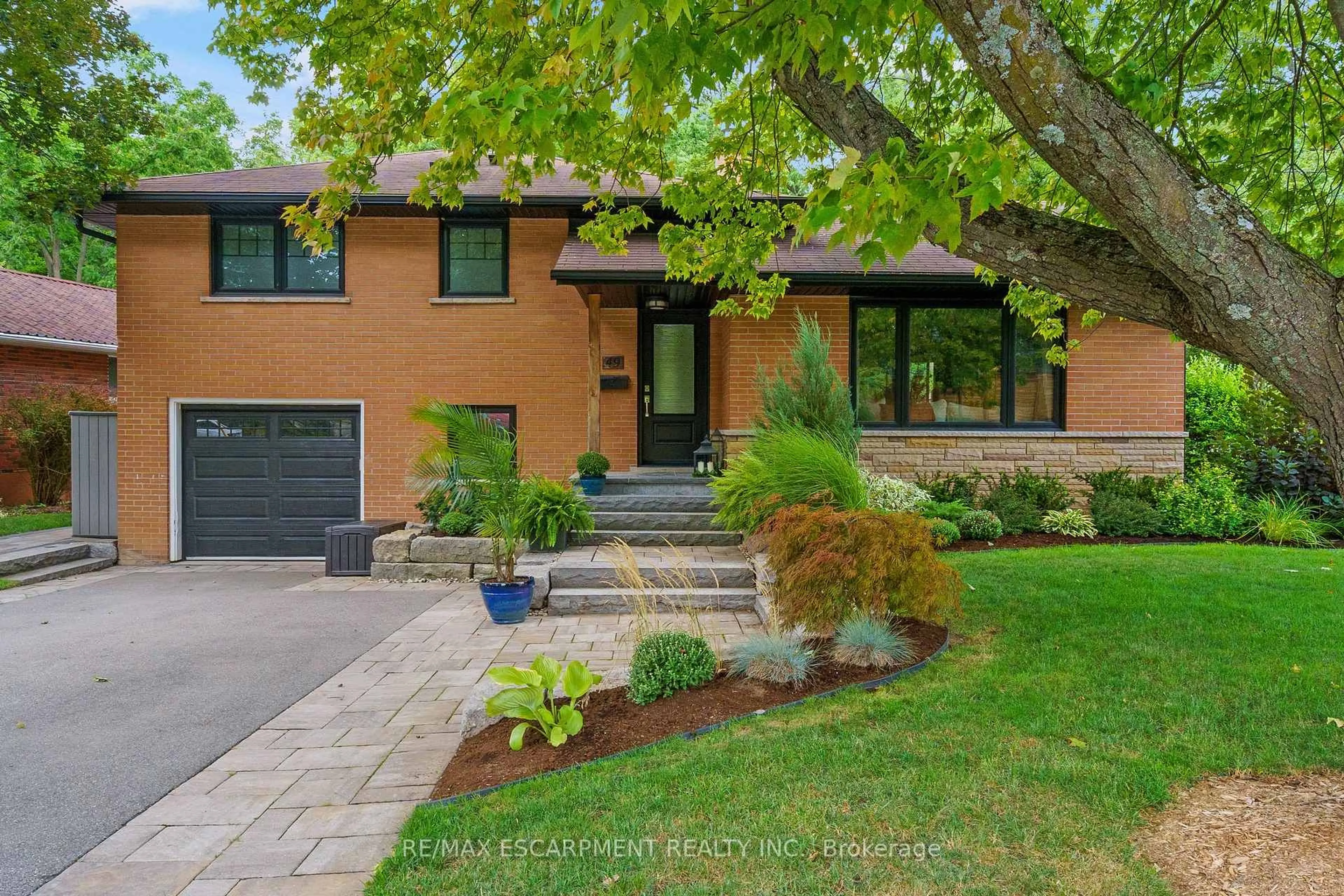 Home with brick exterior material, street for 49 Ann St, Hamilton Ontario L9H 2N4