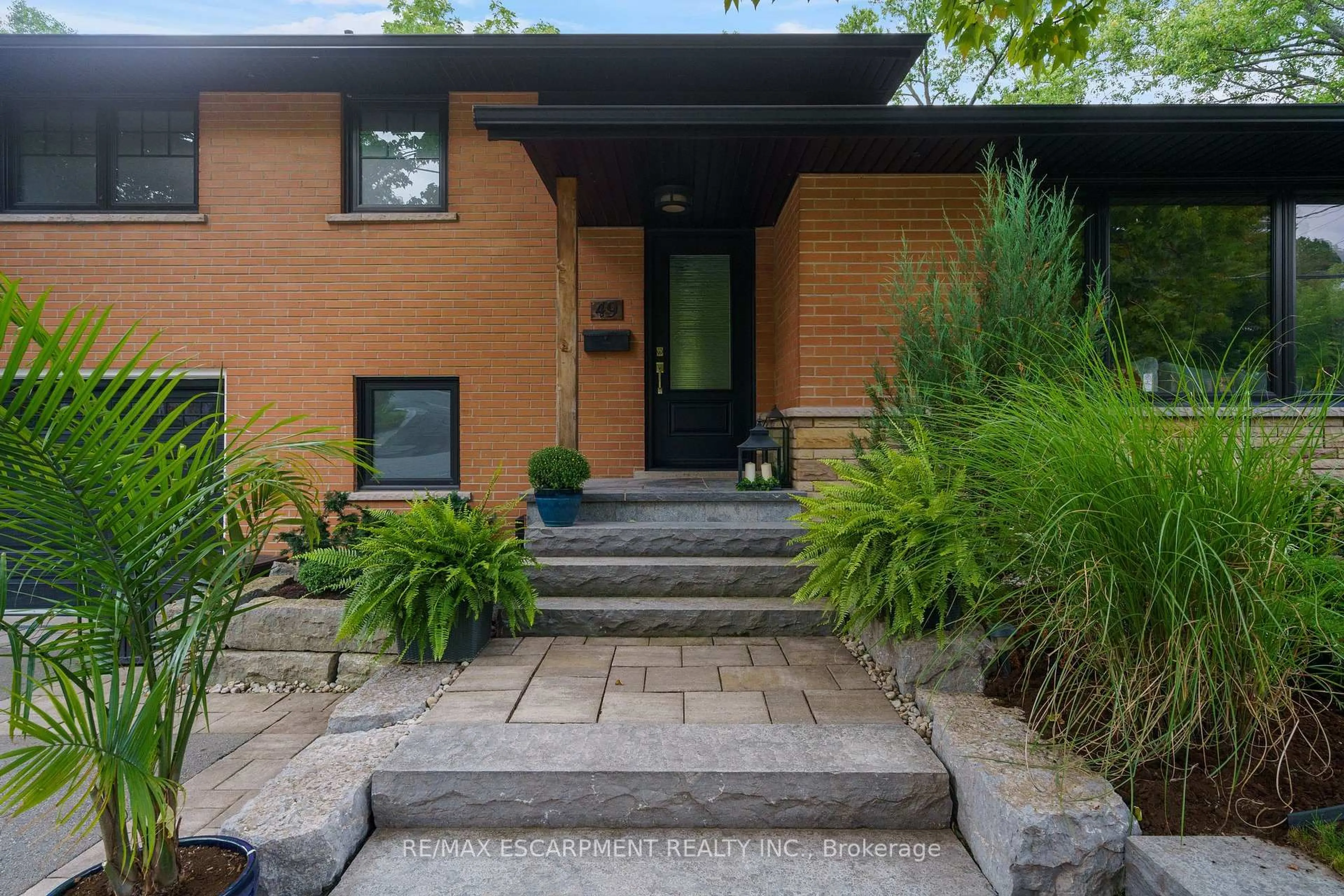 Home with brick exterior material, street for 49 Ann St, Hamilton Ontario L9H 2N4