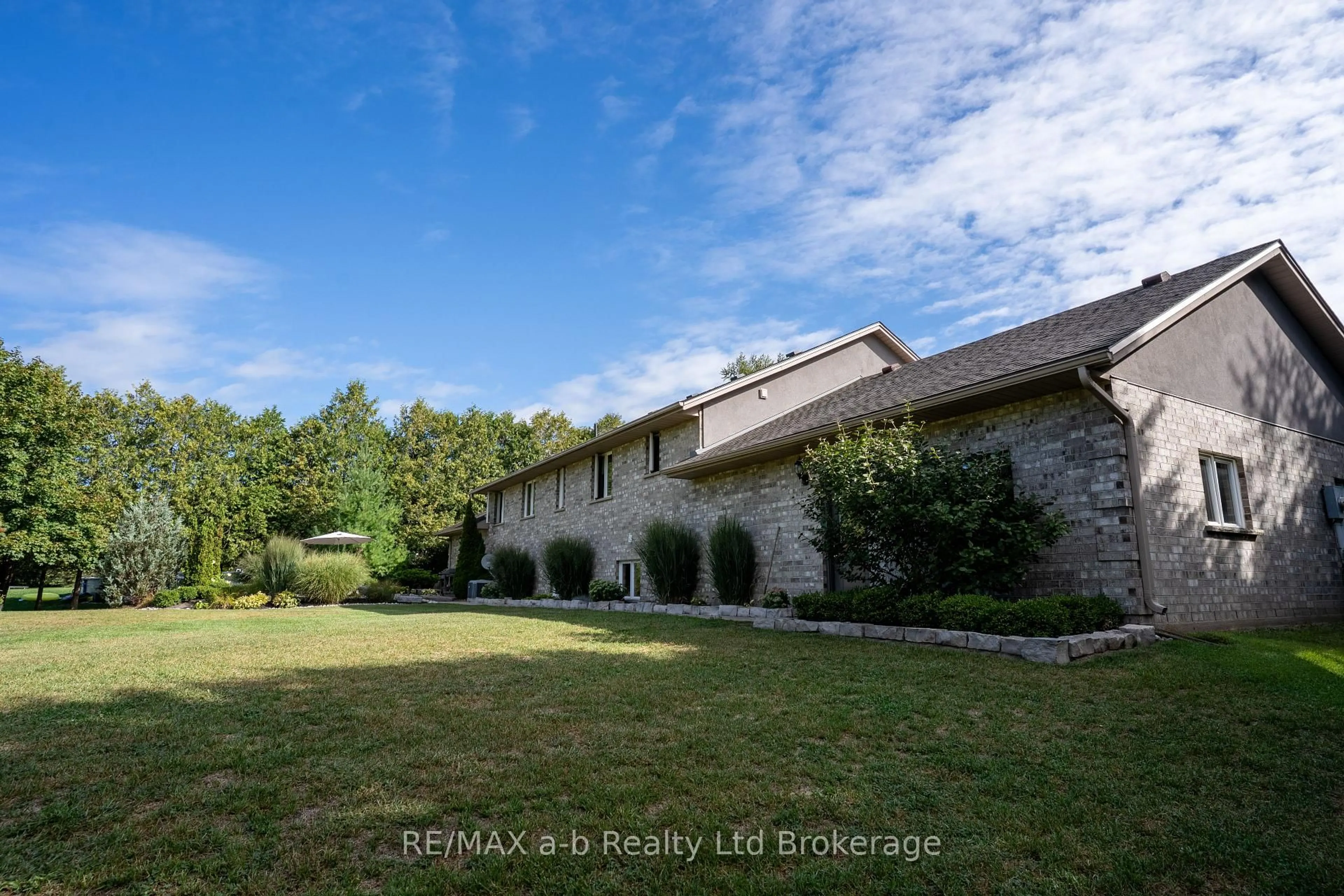 A pic from outside/outdoor area/front of a property/back of a property/a pic from drone, unknown for 812213 Base Line, Norwich Ontario N0E 1H0