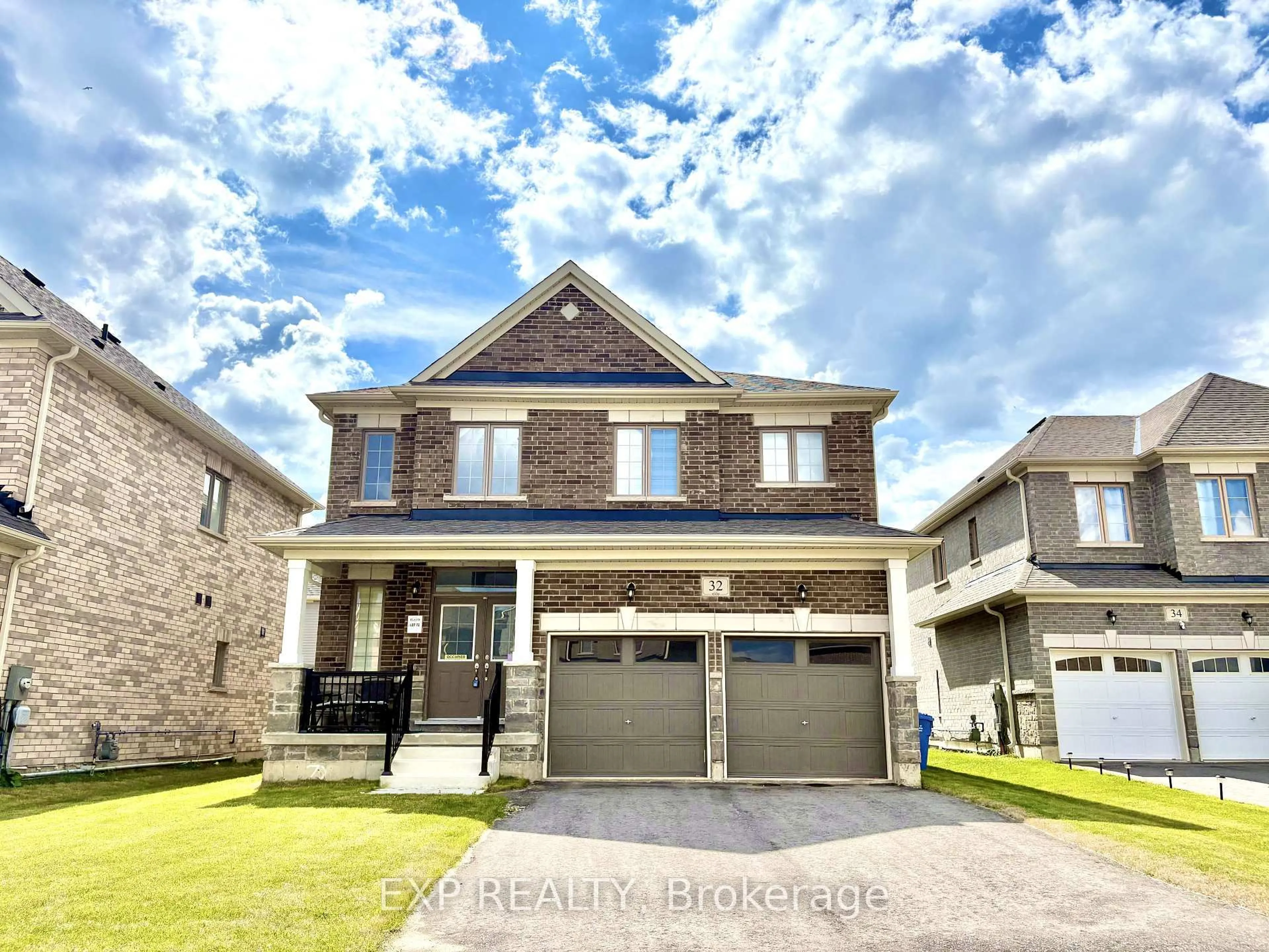 Home with brick exterior material, street for 32 Doc Lougheed Ave, Southgate Ontario N0C 1B0