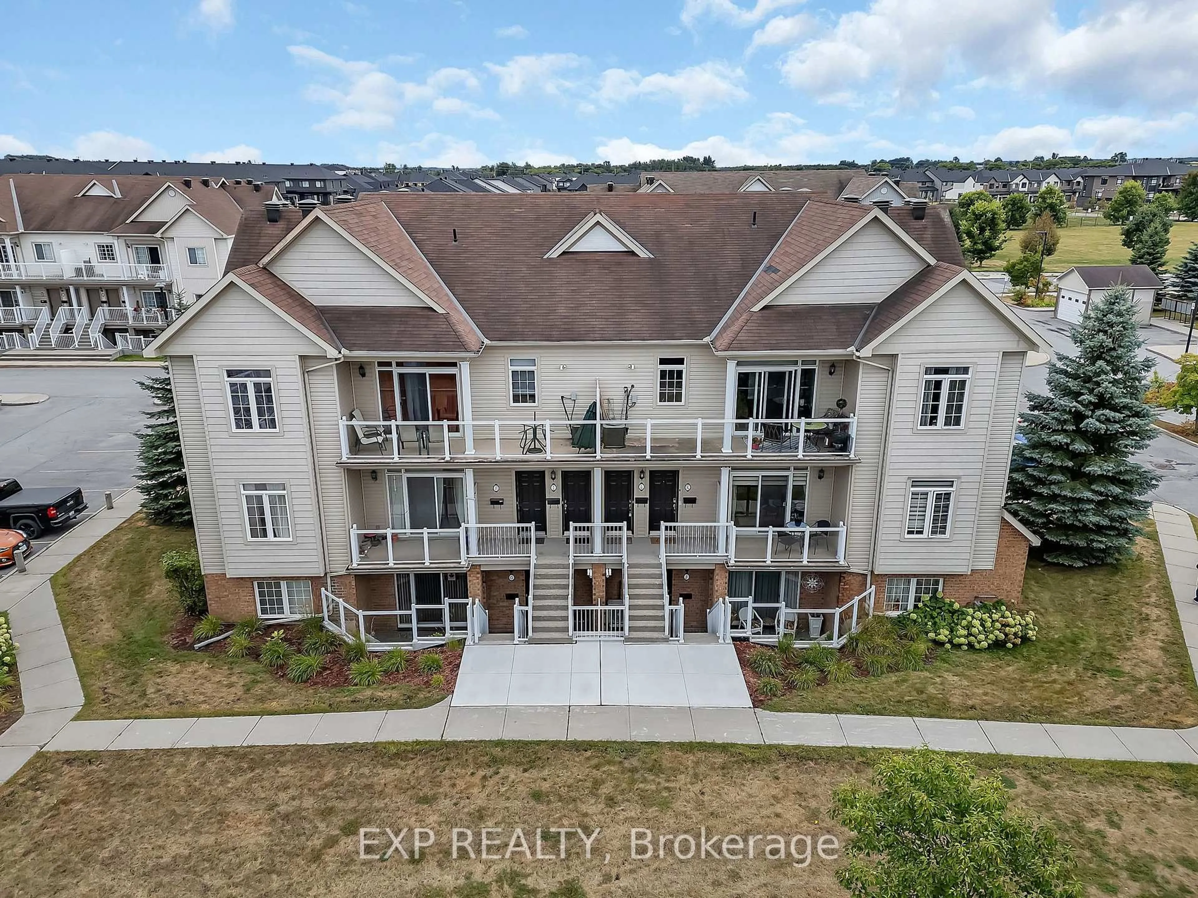 A pic from outside/outdoor area/front of a property/back of a property/a pic from drone, unknown for 107 Artesa Private #L, Ottawa Ontario K2S 0J8