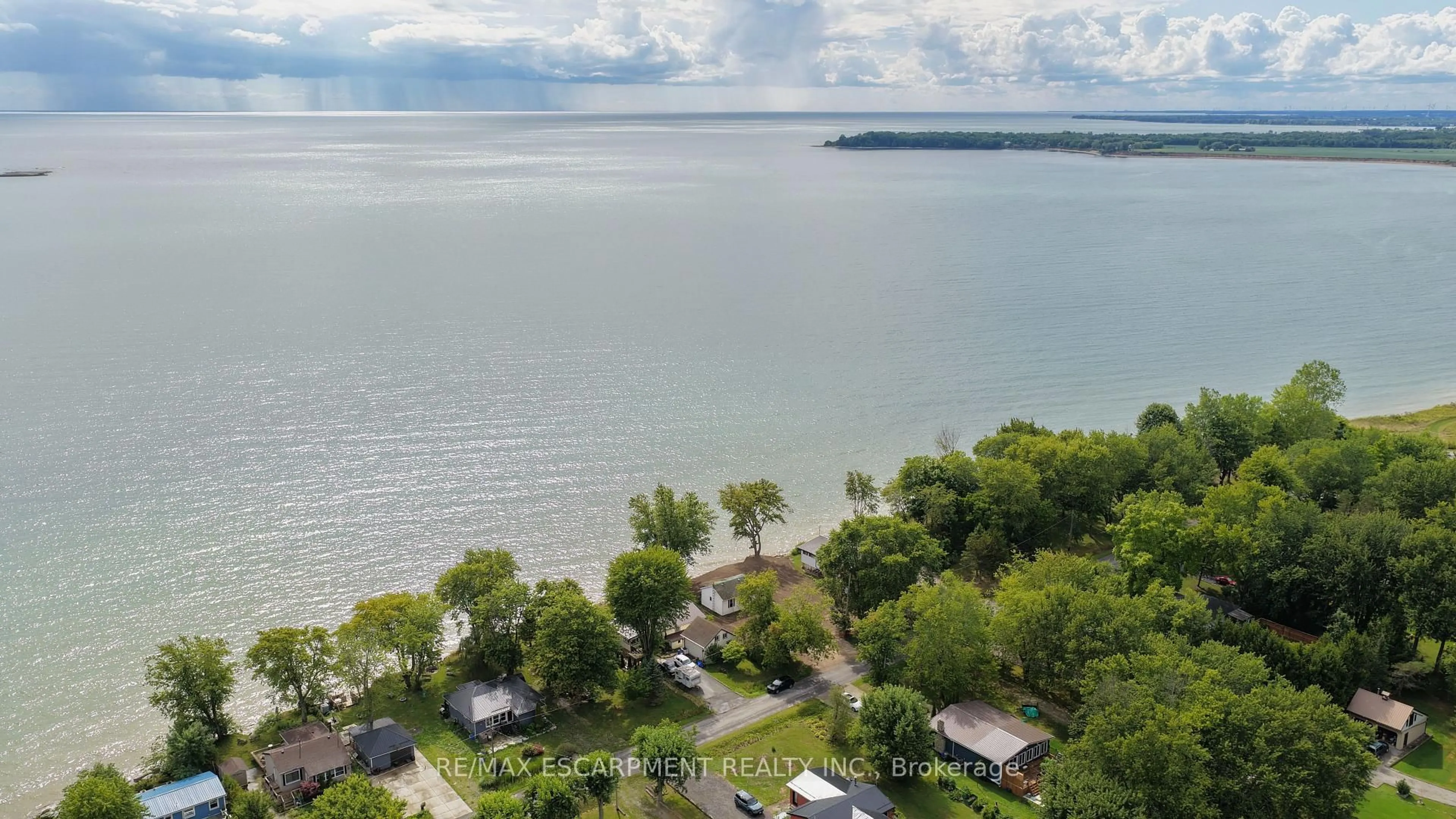 A pic from outside/outdoor area/front of a property/back of a property/a pic from drone, water/lake/river/ocean view for 37 Villella Rd, Haldimand Ontario N0A 1K0