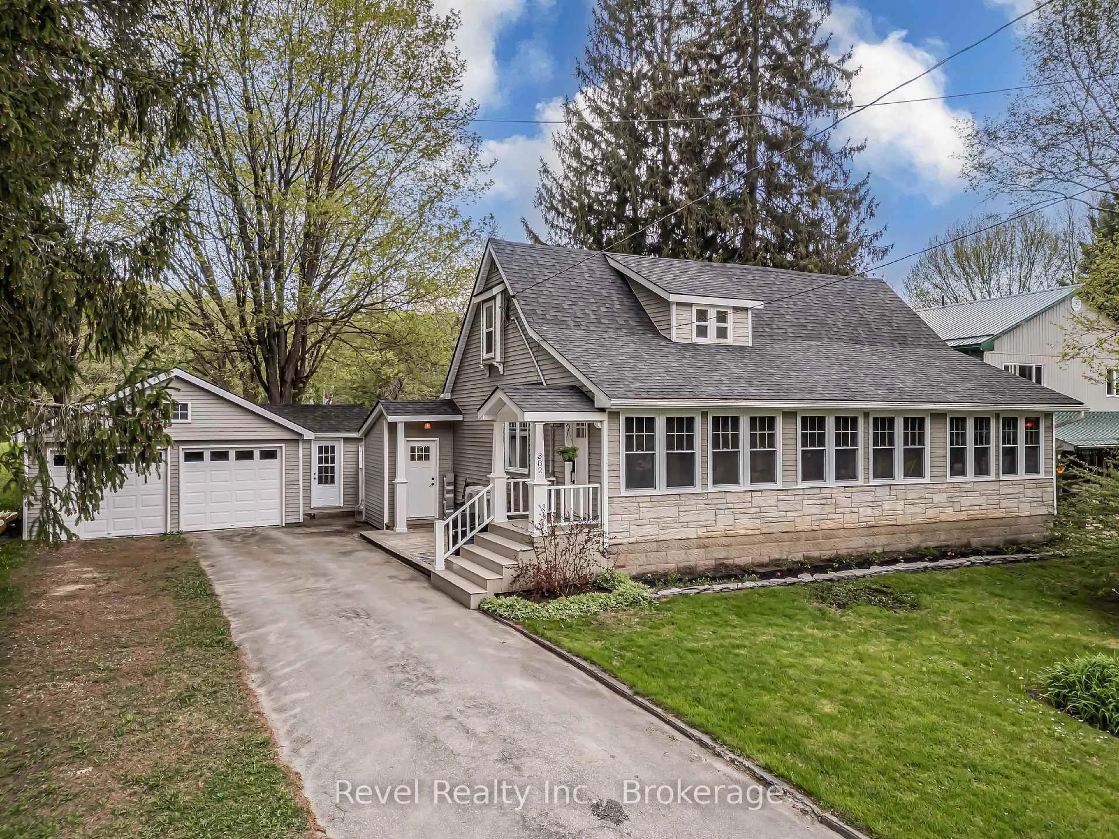 A pic from outside/outdoor area/front of a property/back of a property/a pic from drone, street for 382 2nd Ave, Georgian Bluffs Ontario N4K 5T1