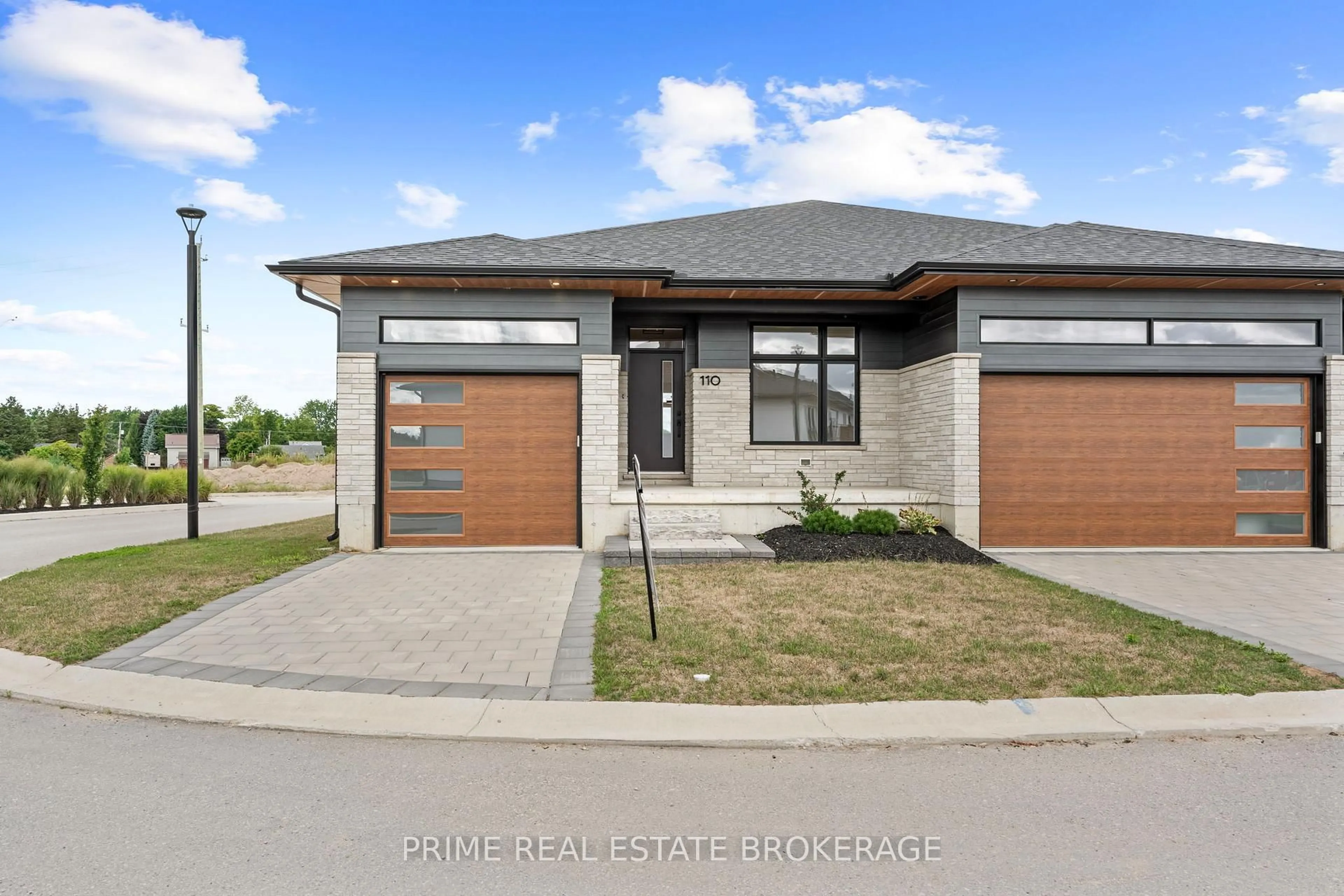 Home with brick exterior material, street for 110 Coastal Cres #1, Lambton Shores Ontario N0M 1T0