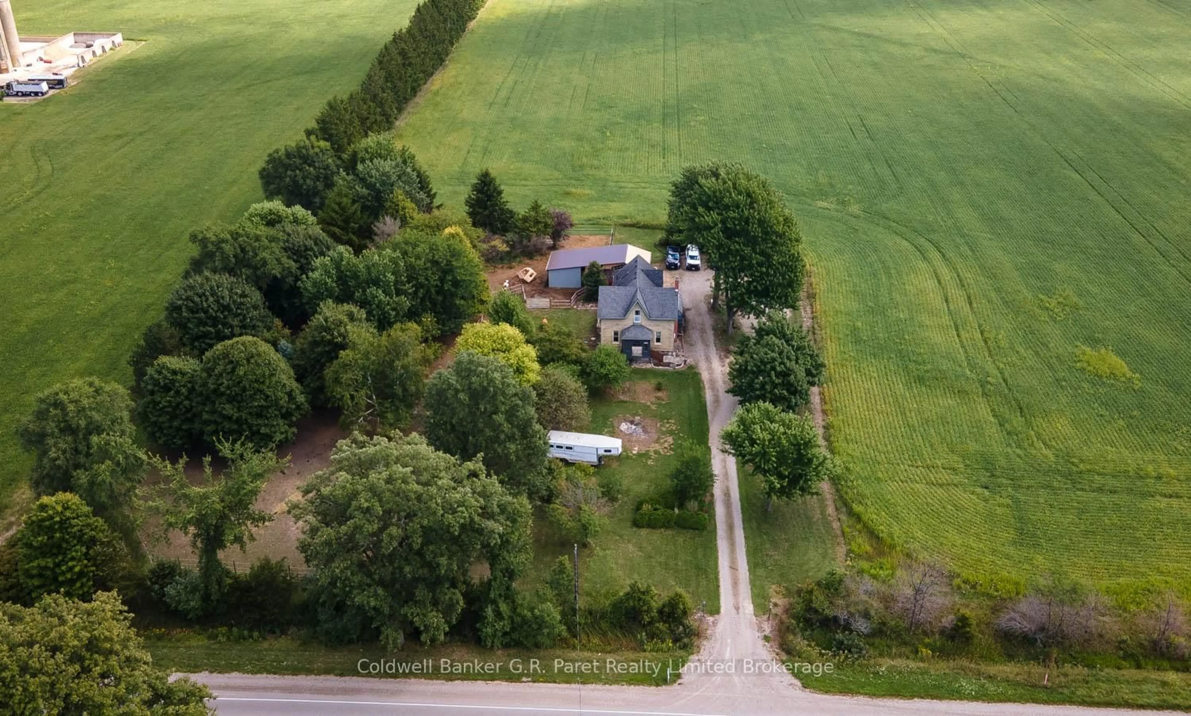 A pic from outside/outdoor area/front of a property/back of a property/a pic from drone, street for 69830 Grand Bend Line, South Huron Ontario N0M 2K0