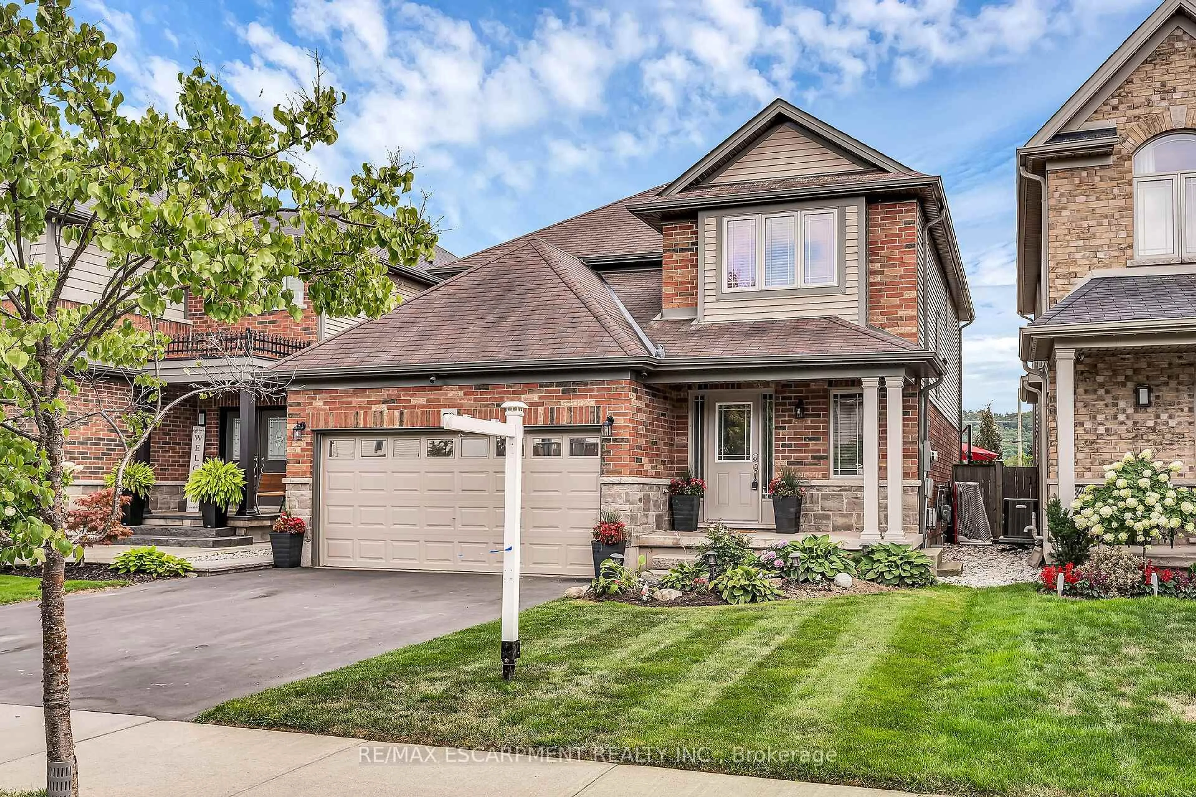 Home with brick exterior material, street for 70 Escarpment Dr, Hamilton Ontario L8E 0G4