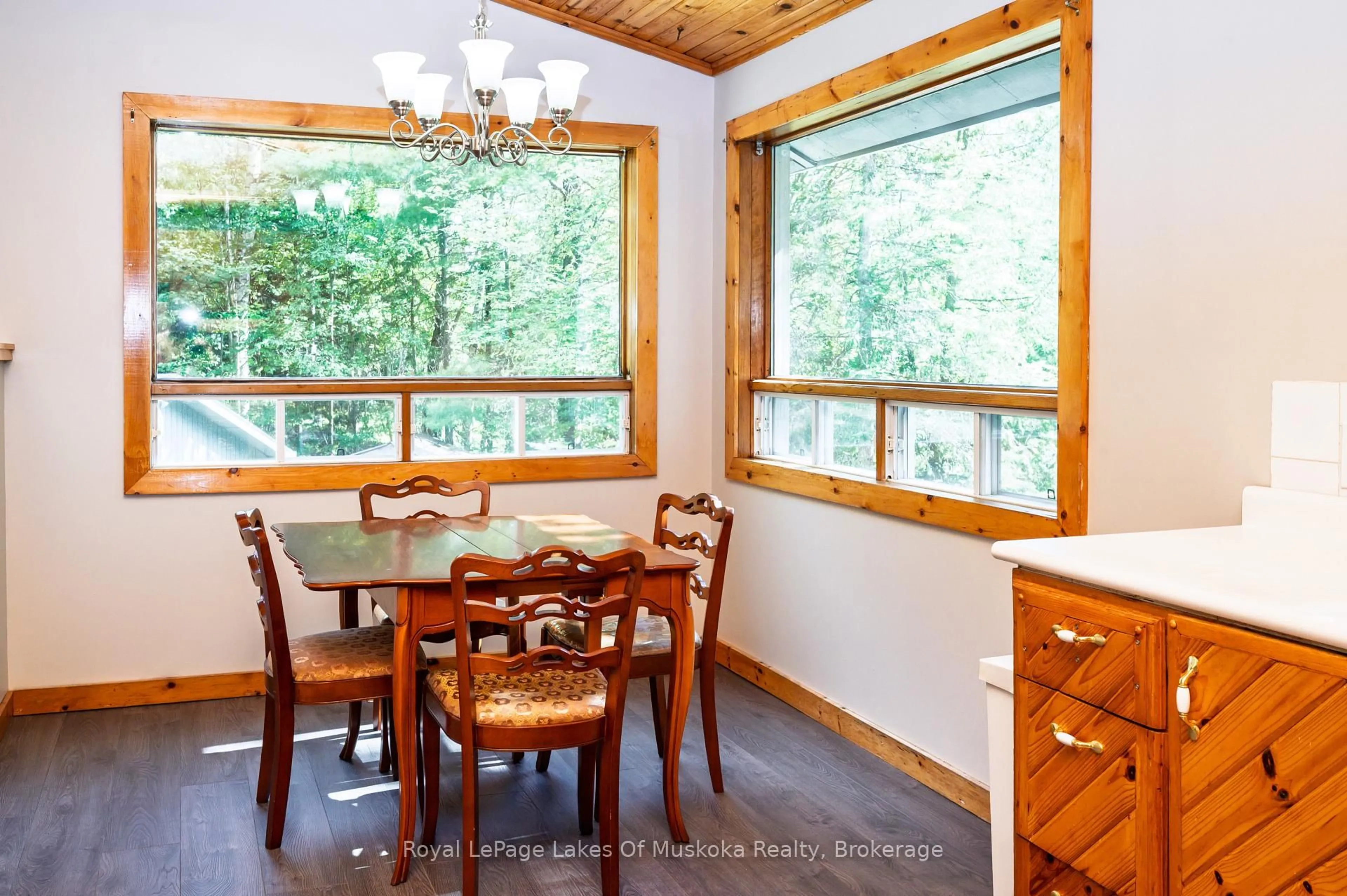 Dining room, wood/laminate floor for 779 Old Muskoka Rd, Huntsville Ontario P0B 1M0