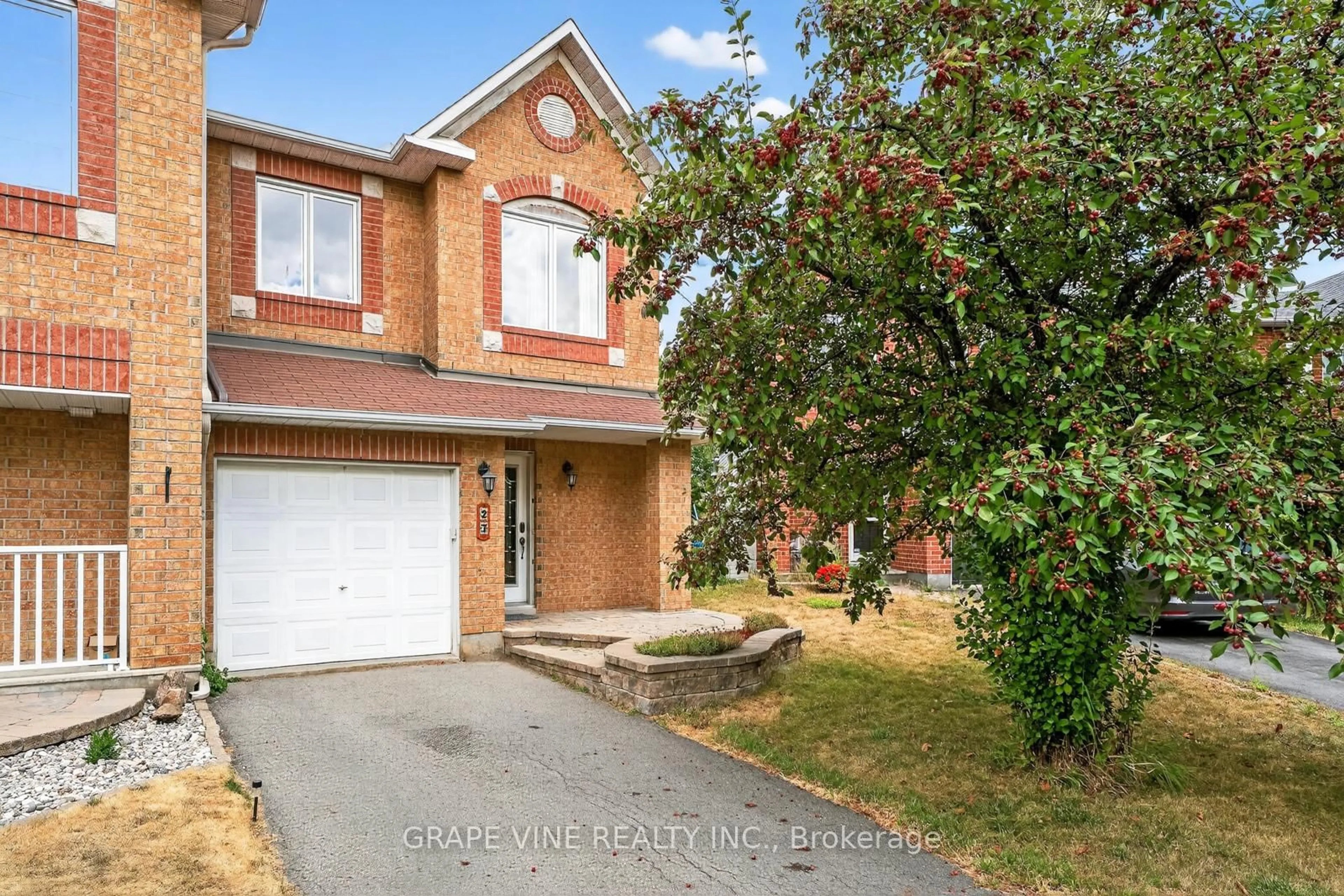Home with brick exterior material, street for 27 Flowertree Cres, Kanata Ontario K2M 2R8