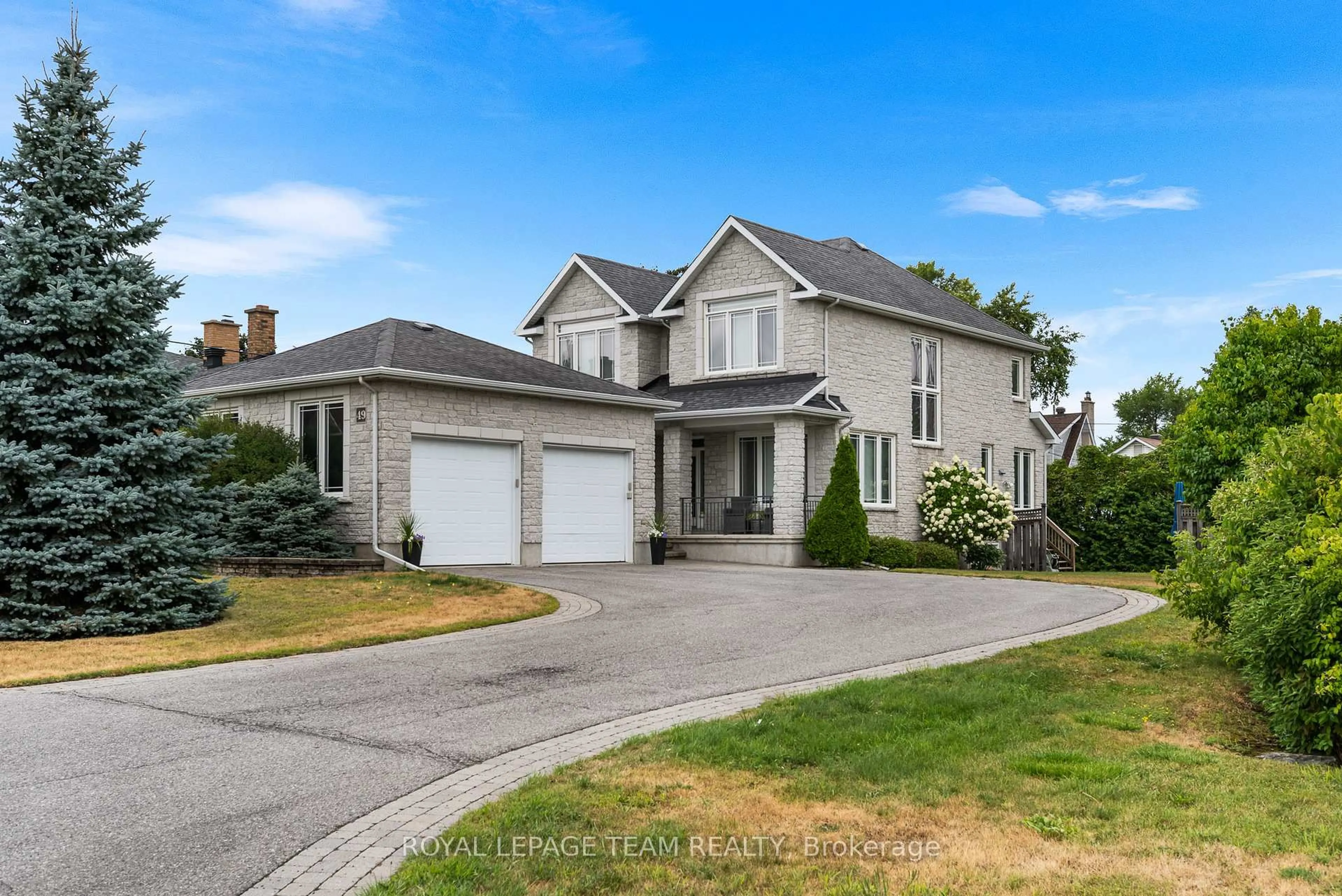 Home with vinyl exterior material, street for 49 Savuto Way, Ottawa Ontario K2G 2T2