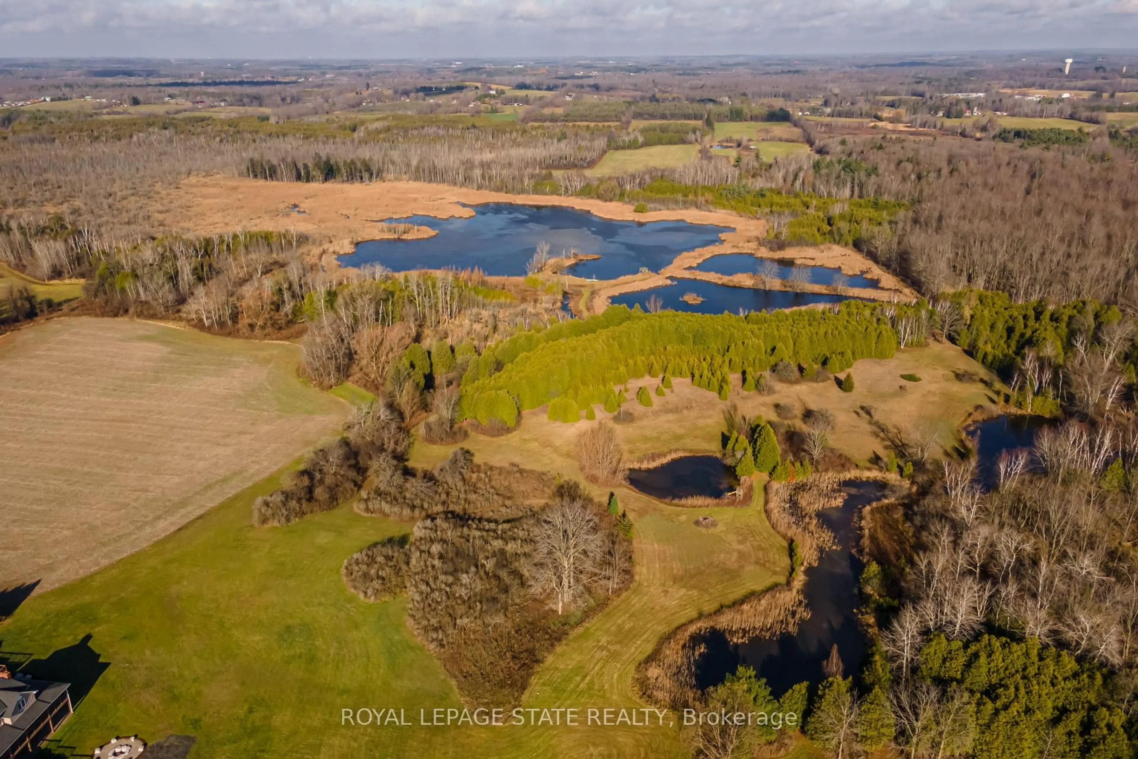 A pic from outside/outdoor area/front of a property/back of a property/a pic from drone, water/lake/river/ocean view for 1041 Concession 8 RR 3 W, Hamilton Ontario N0B 2J0