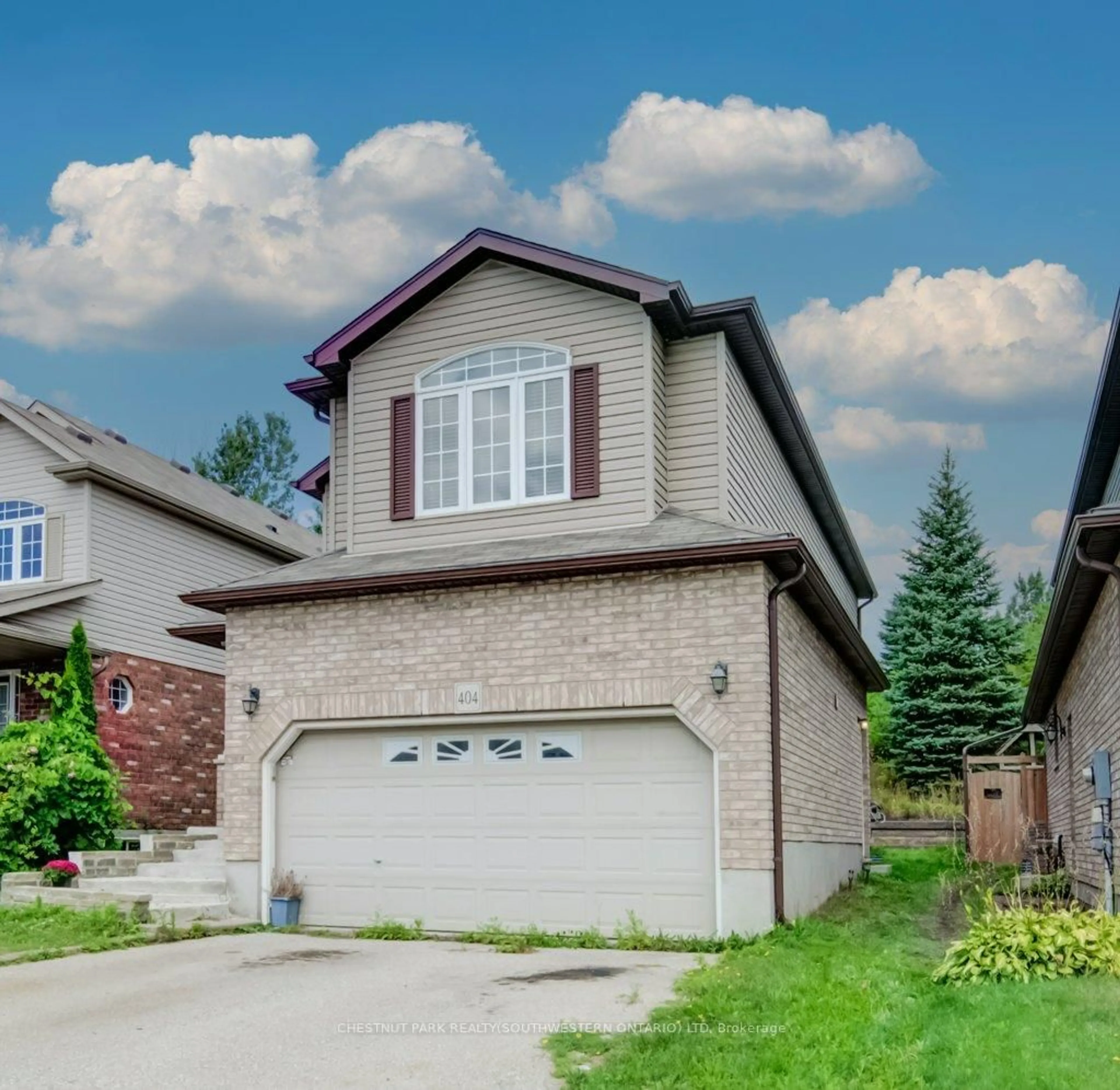 Home with vinyl exterior material, street for 404 Tealby Cres, Waterloo Ontario N2J 4Y8