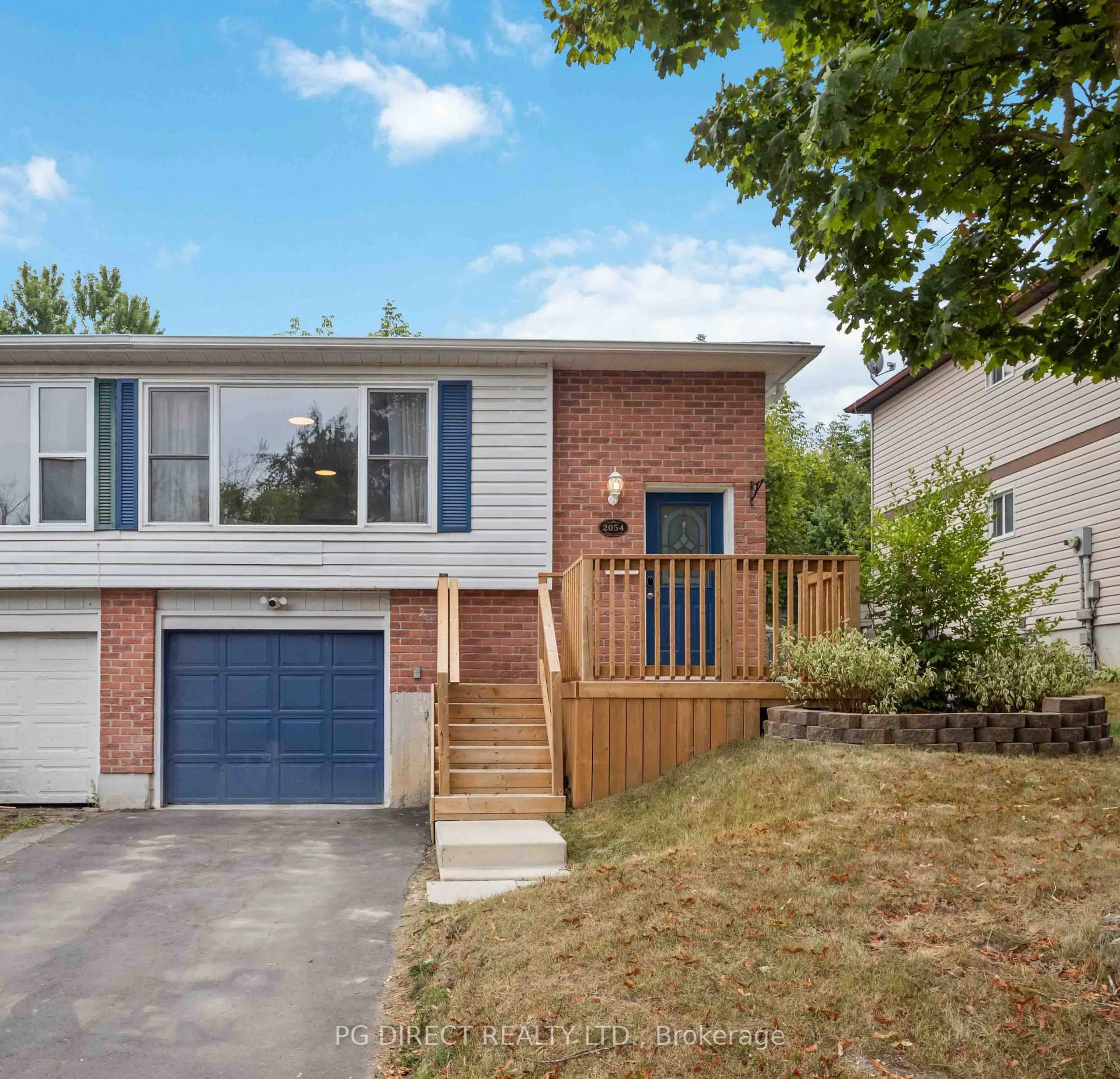 Home with brick exterior material, street for 2054 Walker Ave, Peterborough Ontario K9L 1S1