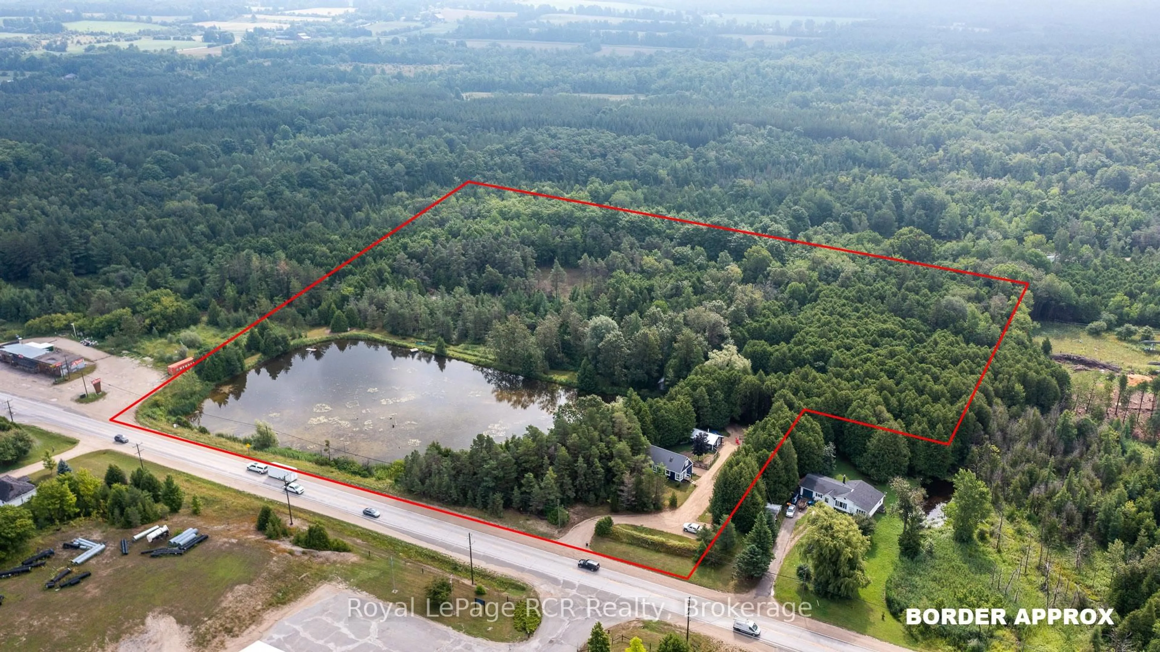 A pic from outside/outdoor area/front of a property/back of a property/a pic from drone, forest/trees view for 121 Collingwood St, Grey Highlands Ontario N0C 1E0