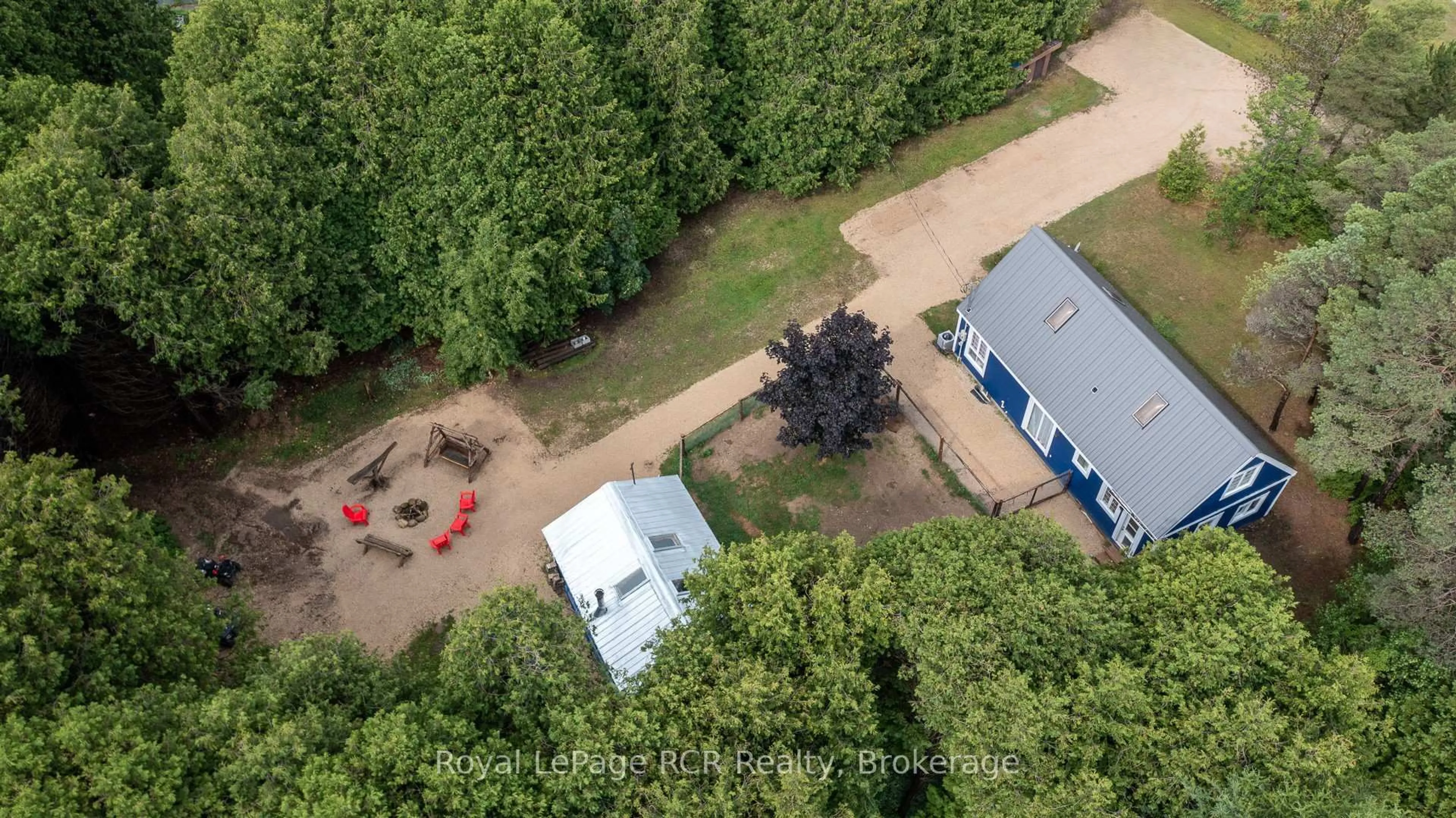 A pic from outside/outdoor area/front of a property/back of a property/a pic from drone, forest/trees view for 121 Collingwood St, Grey Highlands Ontario N0C 1E0