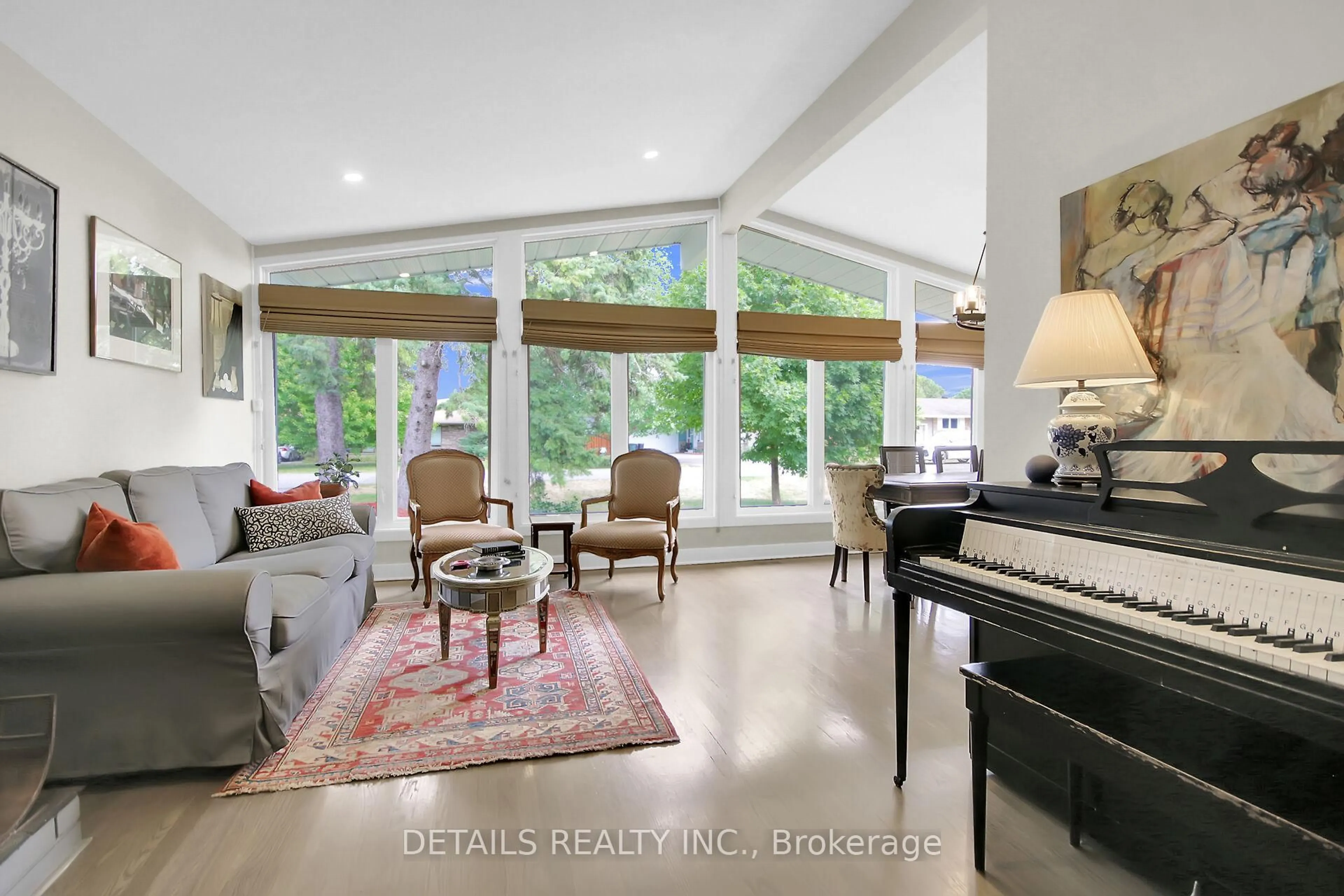 Living room with furniture, ceramic/tile floor for 10 Aberfeldy St, Ottawa Ontario K2H 6H5