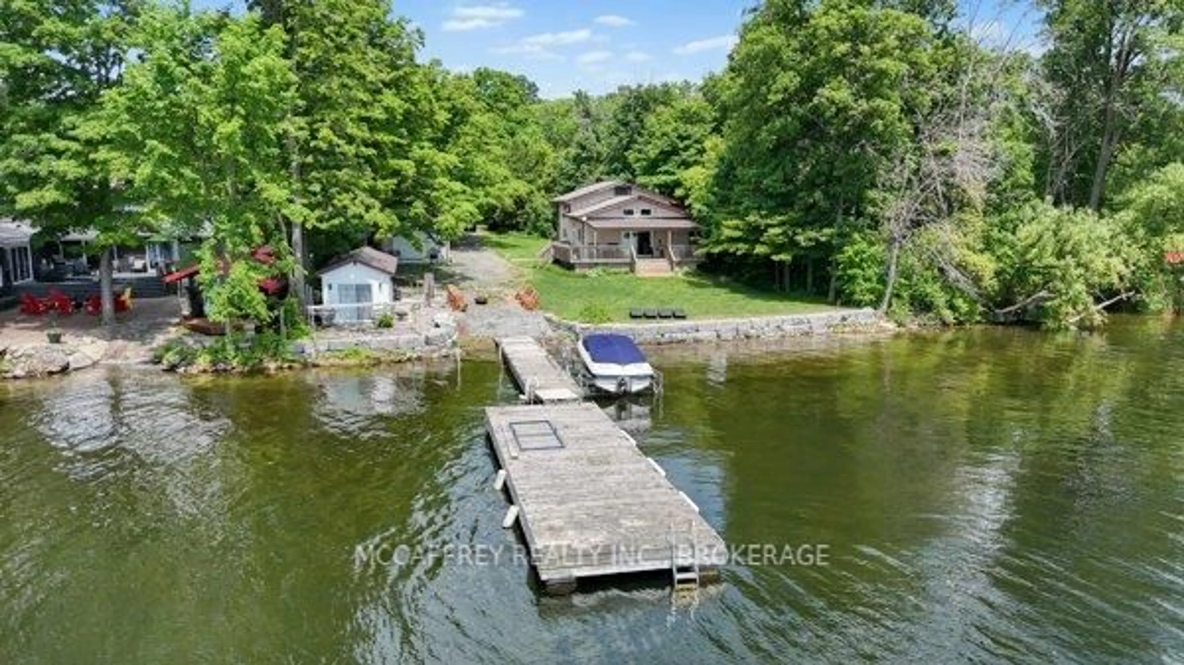 A pic from outside/outdoor area/front of a property/back of a property/a pic from drone, water/lake/river/ocean view for 76 Bass Cove Rd, Napanee Ontario K7R 3K7