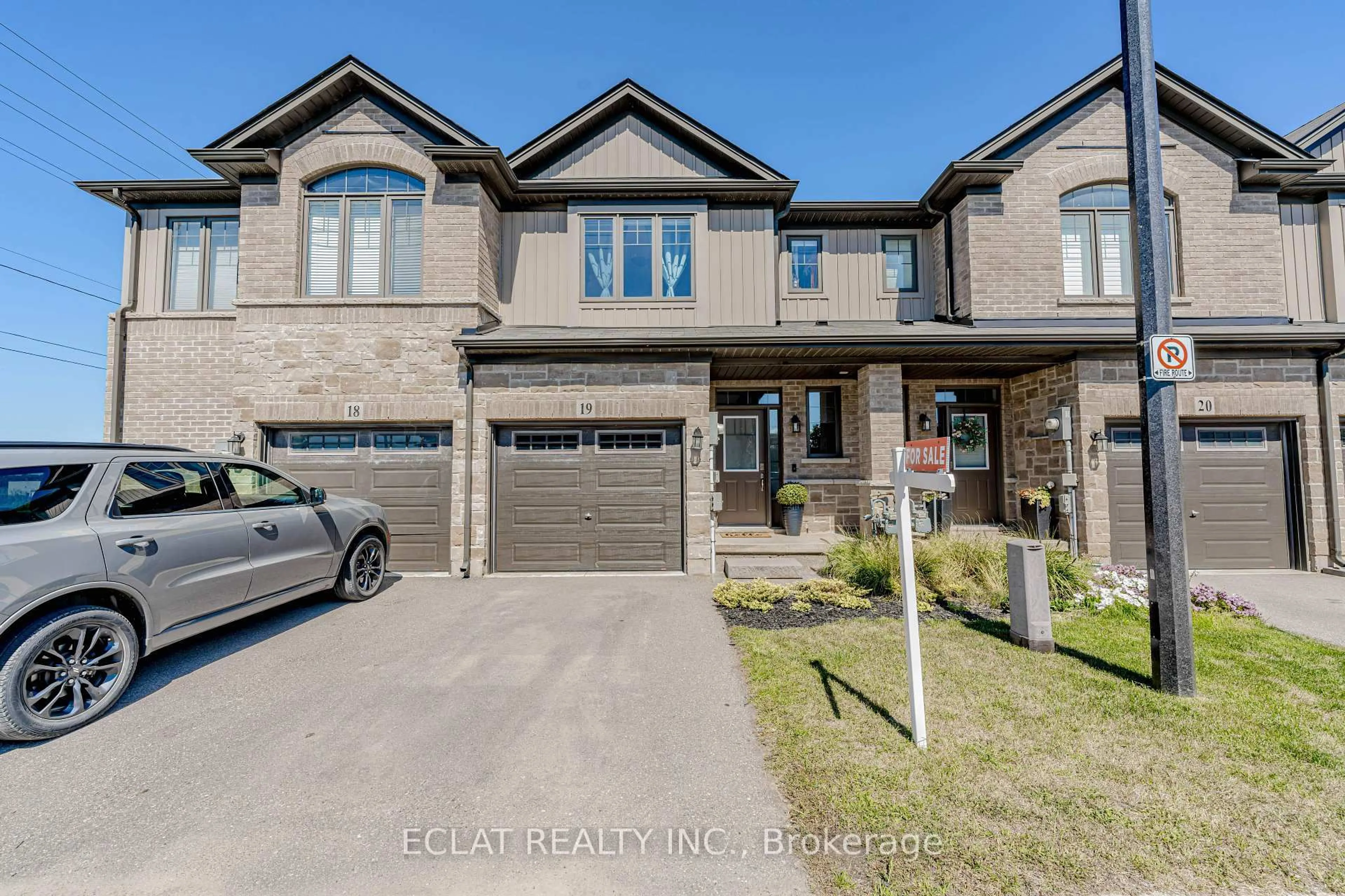 Home with brick exterior material, street for 1 Tom Brown Dr #19, Brant Ontario N3L 0H8