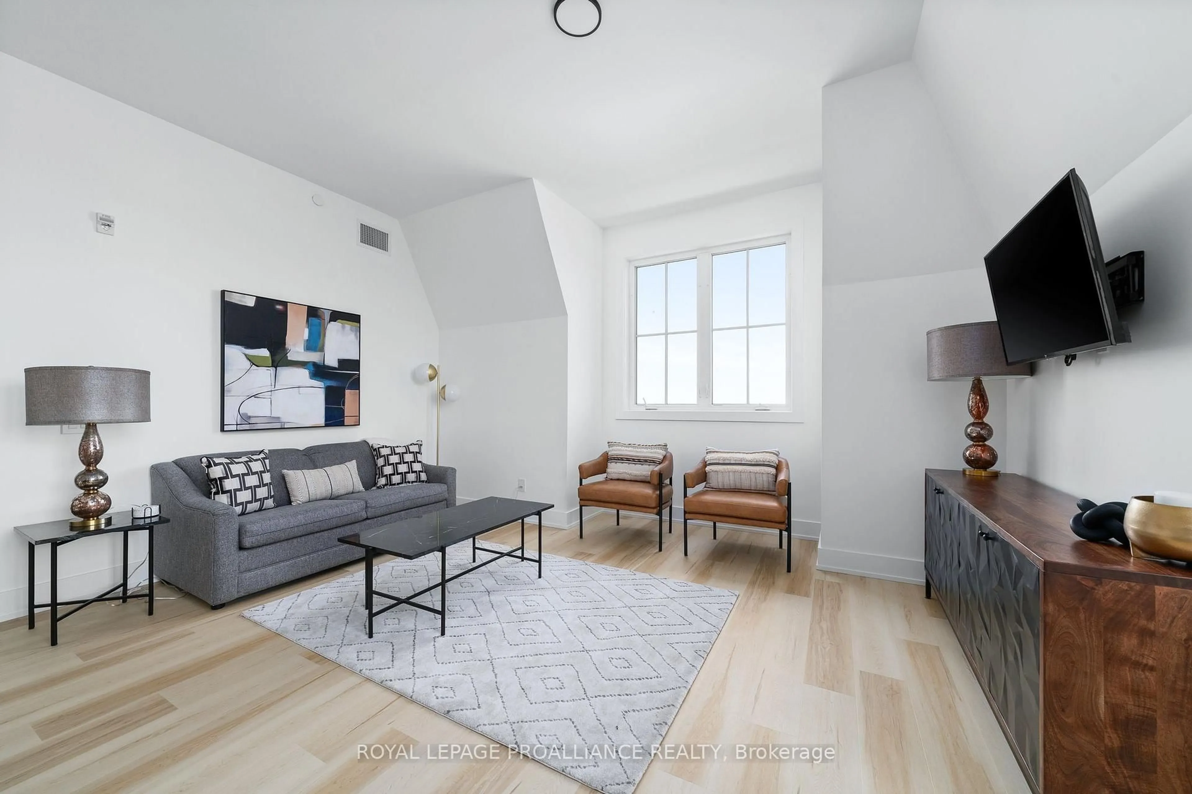 Living room with furniture, unknown for 941 Charles Wilson Pkwy #301, Cobourg Ontario K9A 0L2