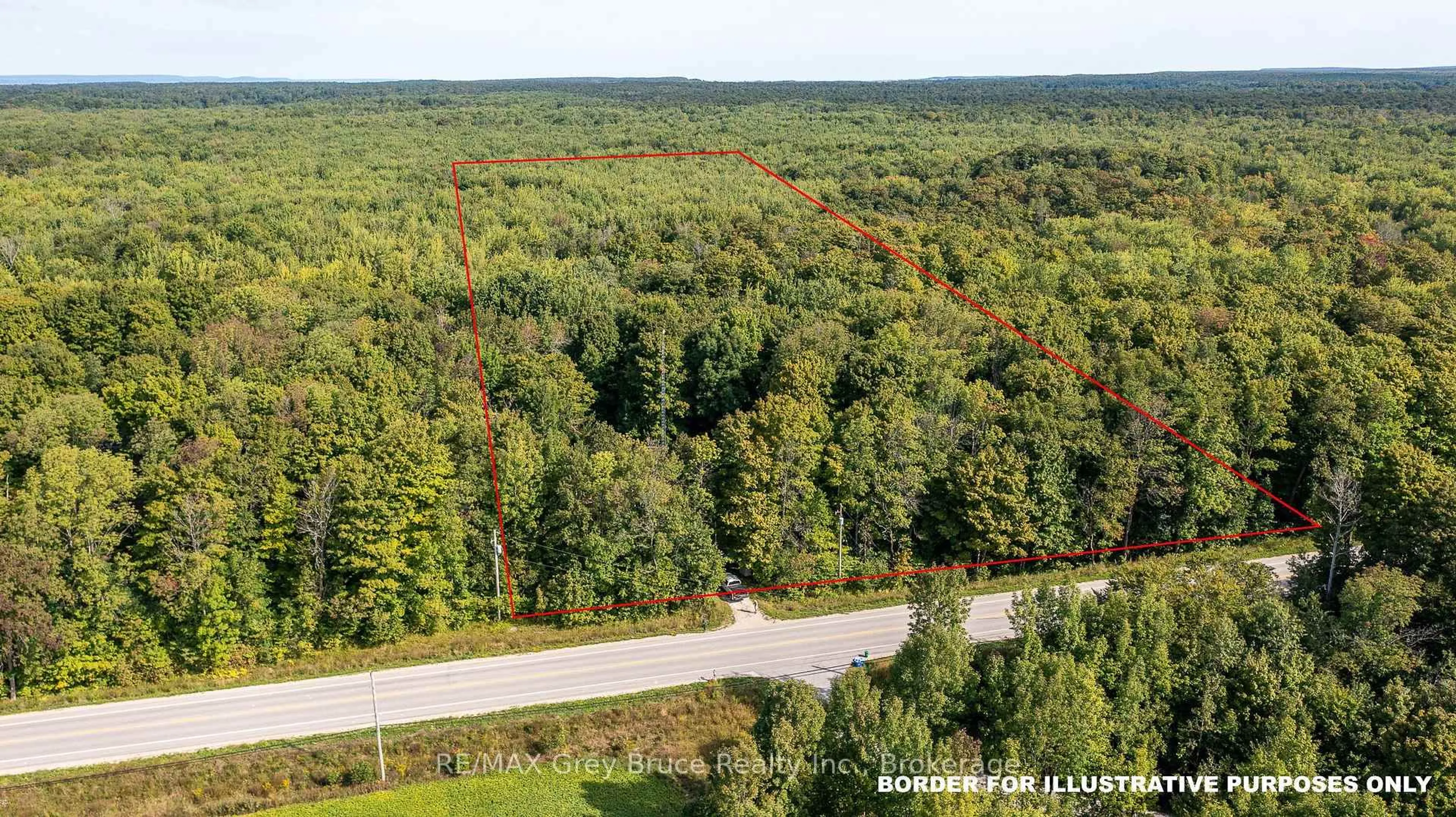 A pic from outside/outdoor area/front of a property/back of a property/a pic from drone, forest/trees view for 103777 Grey Road 18 Rd, Meaford Ontario N4K 5N8