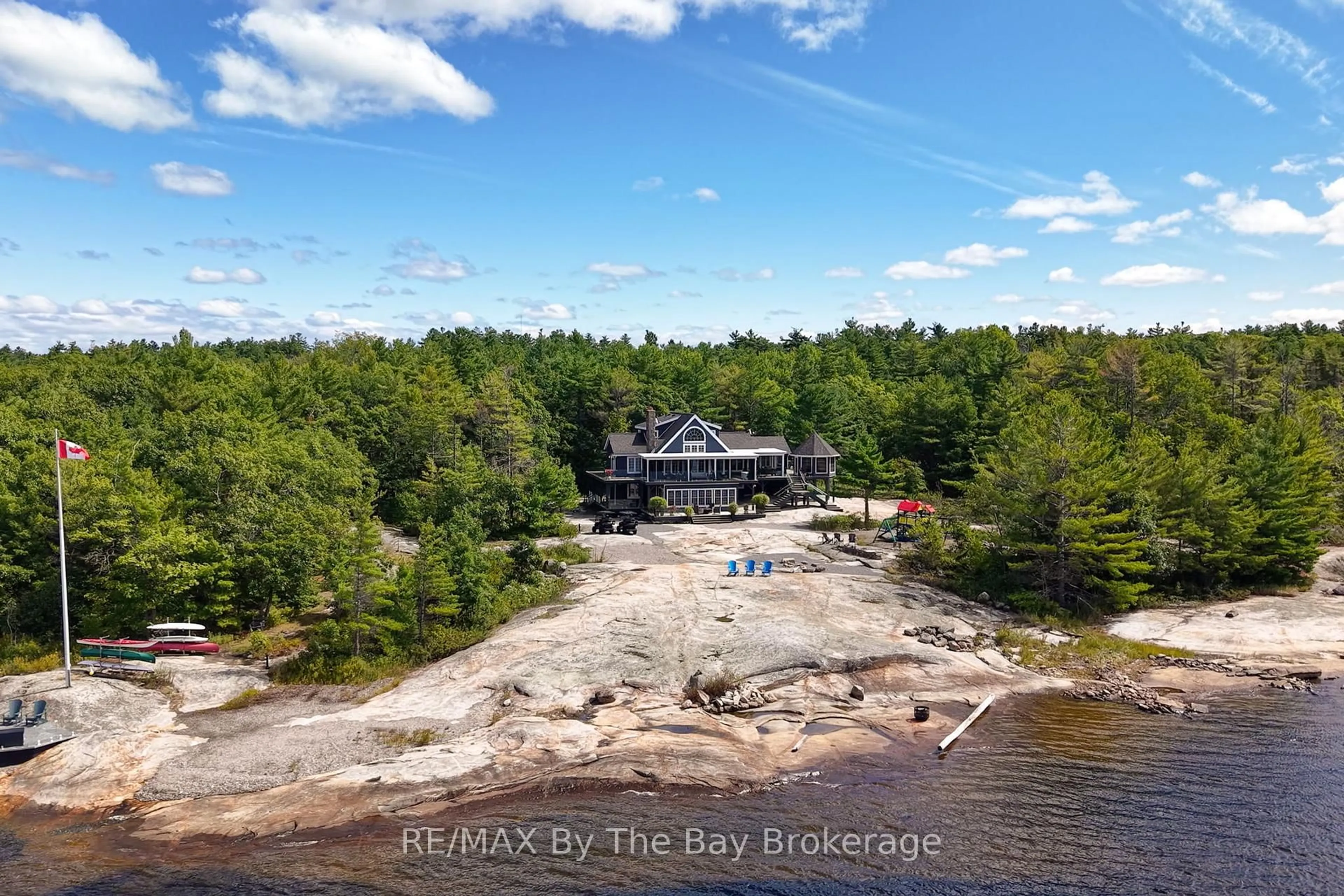 A pic from outside/outdoor area/front of a property/back of a property/a pic from drone, water/lake/river/ocean view for 19980 Georgian Bay Shore, Georgian Bay Ontario P0E 1E0