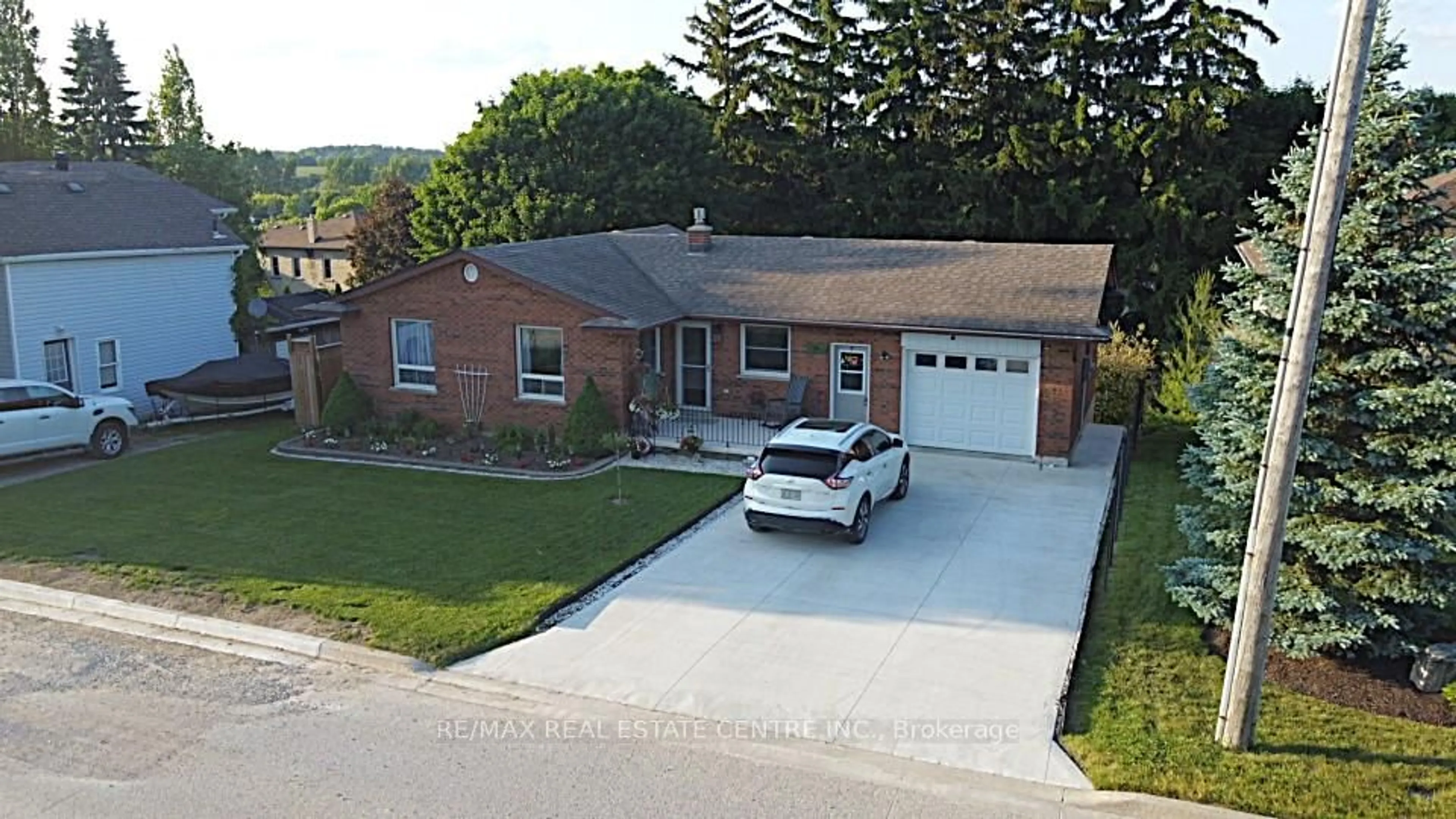 Home with brick exterior material, street for 30 High St, Mapleton Ontario N0G 1P0