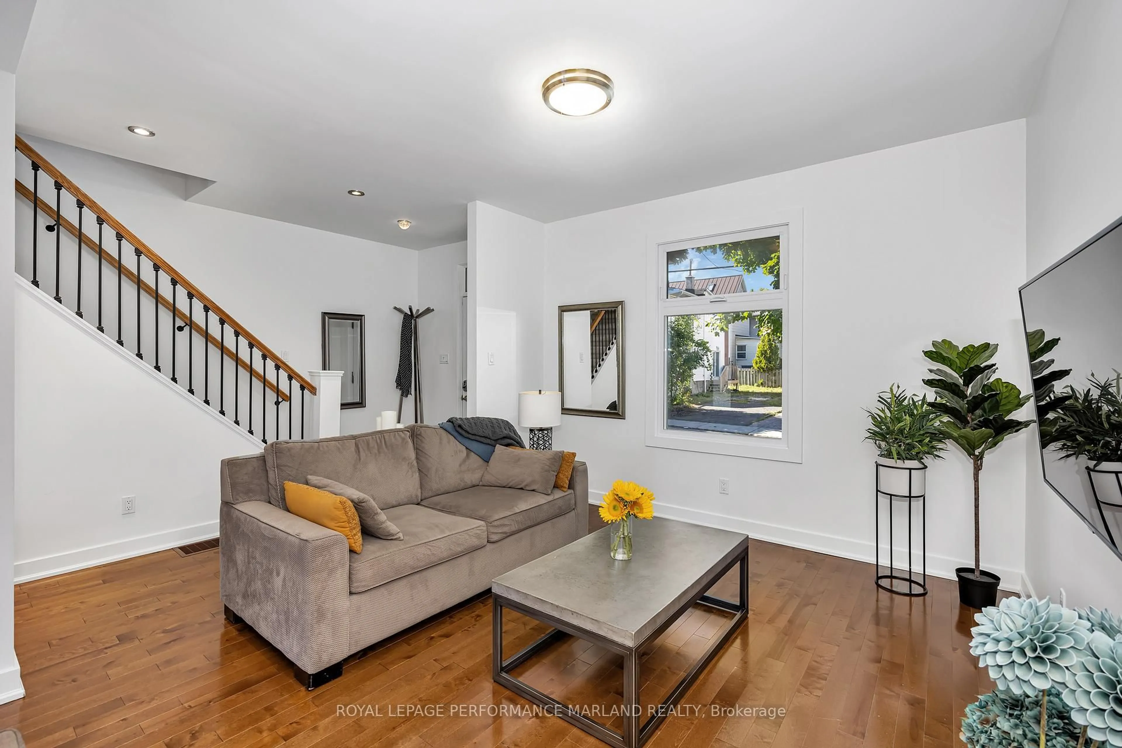 Living room with furniture, unknown for 174 Hawthorne Ave, Ottawa Ontario K1S 0B5