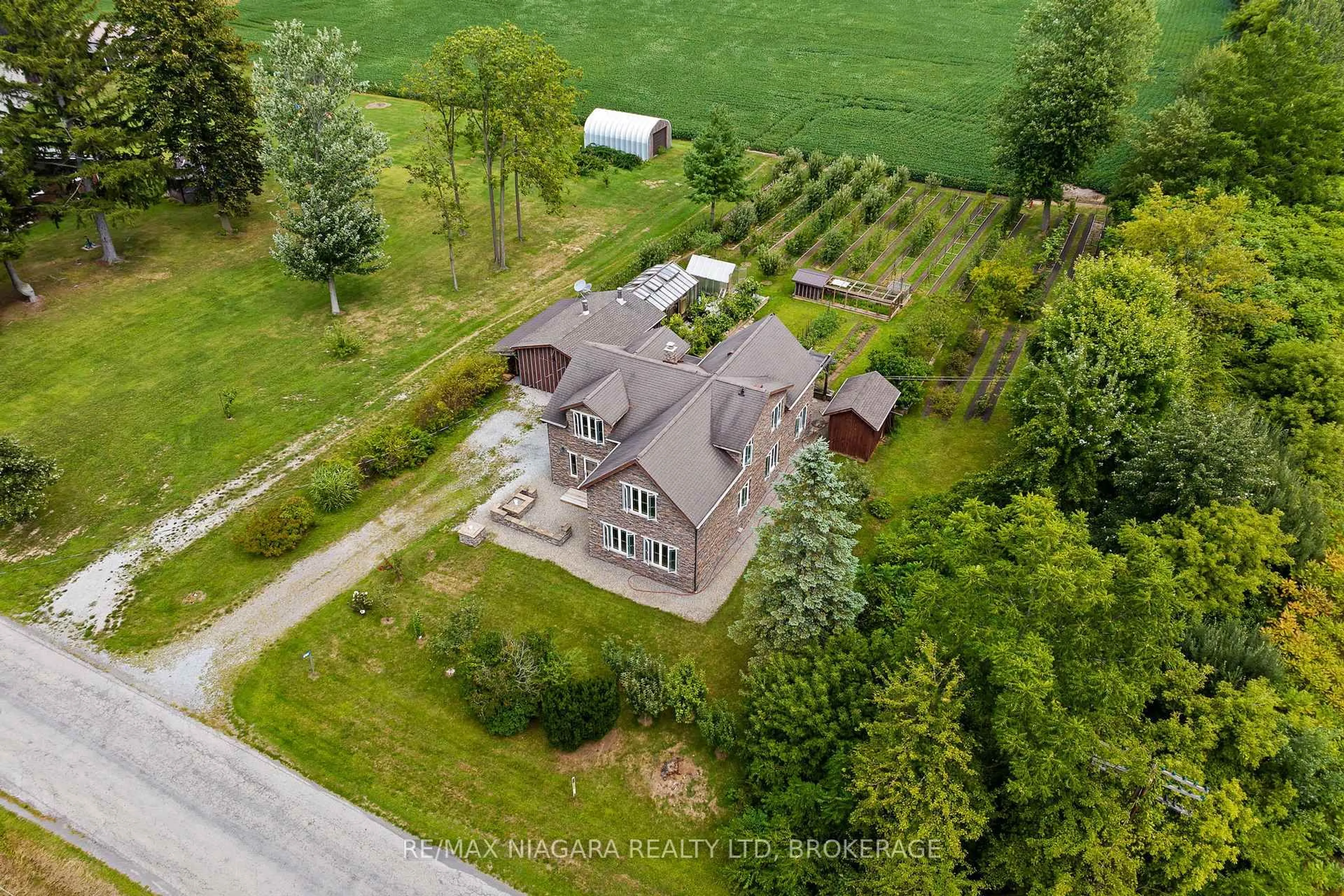A pic from outside/outdoor area/front of a property/back of a property/a pic from drone, street for 63023 Perry Rd, Wainfleet Ontario L0R 2J0