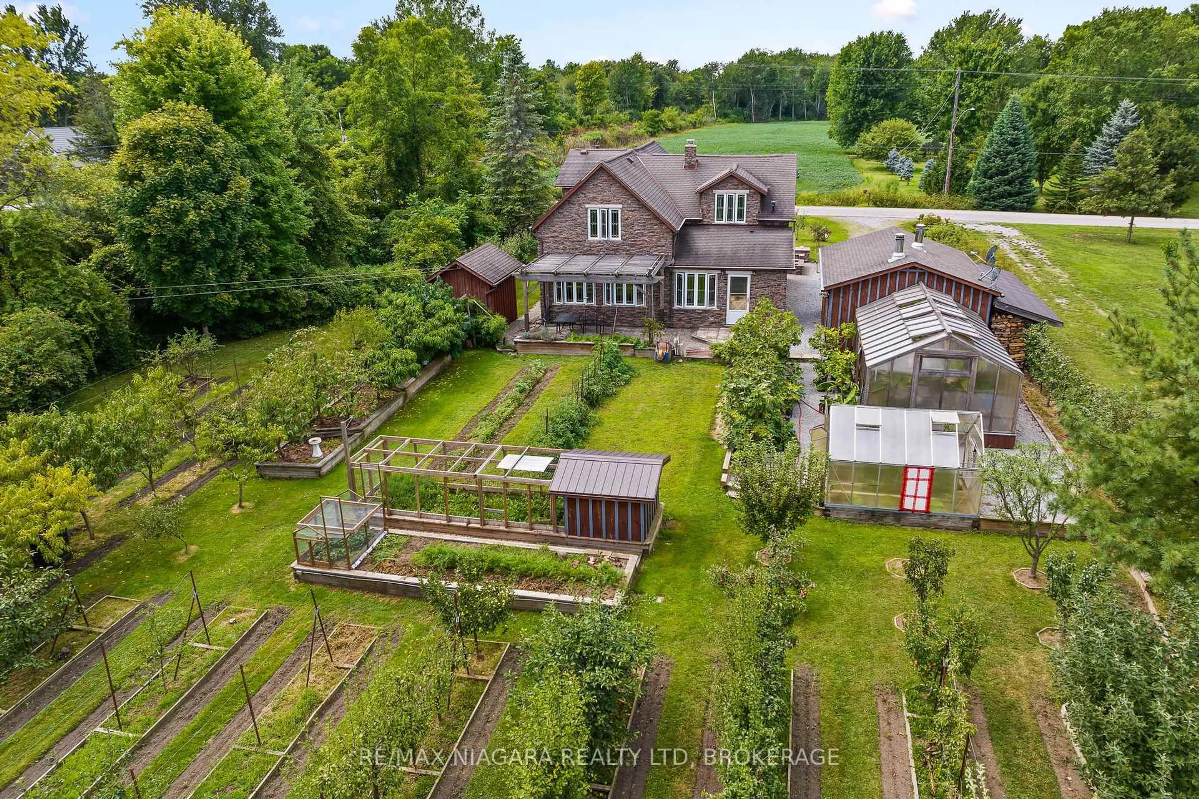A pic from outside/outdoor area/front of a property/back of a property/a pic from drone, unknown for 63023 Perry Rd, Wainfleet Ontario L0R 2J0
