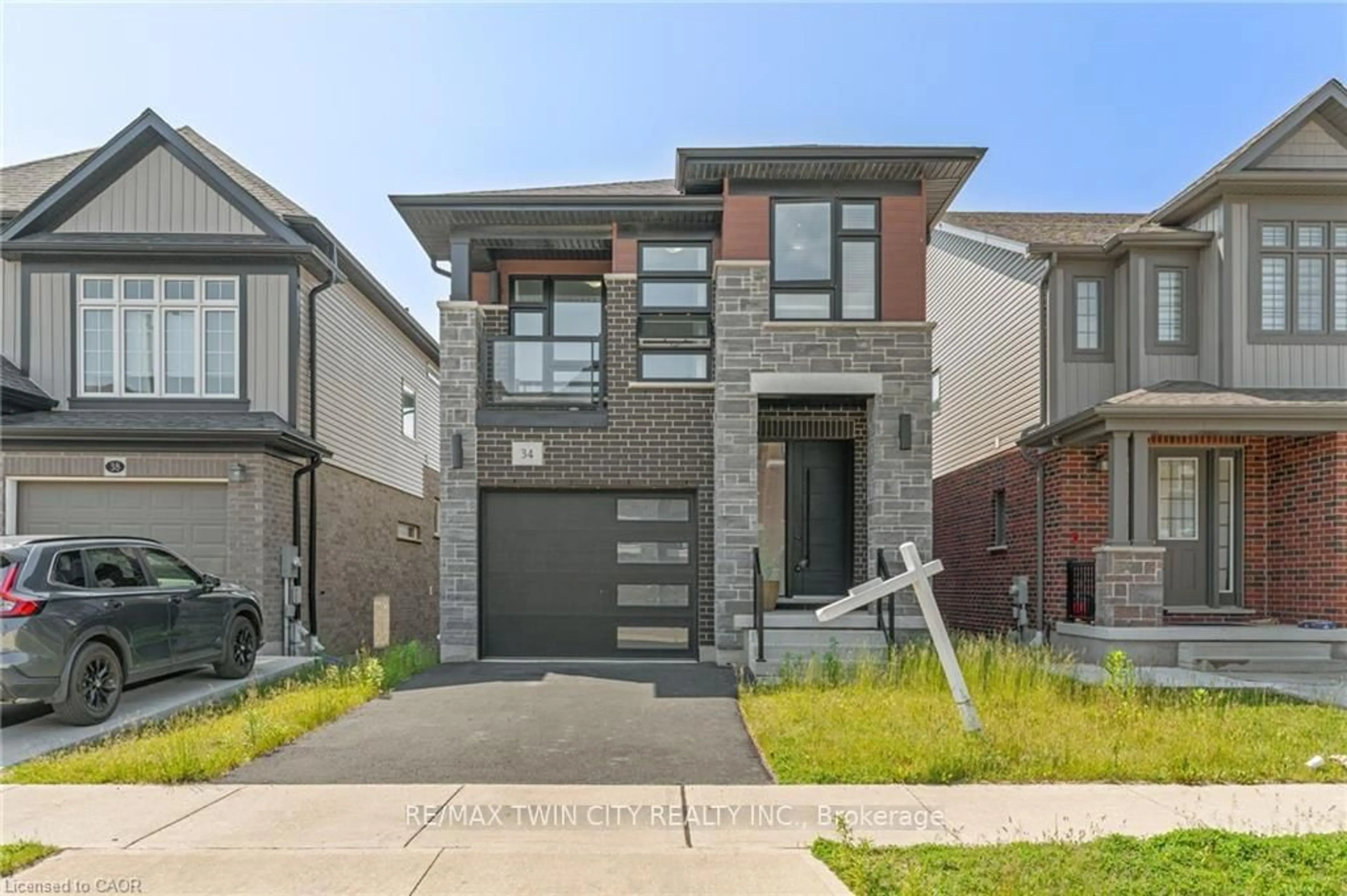 Home with brick exterior material, street for 34 SPORTSMAN HILL St, Kitchener Ontario N2P 0J3