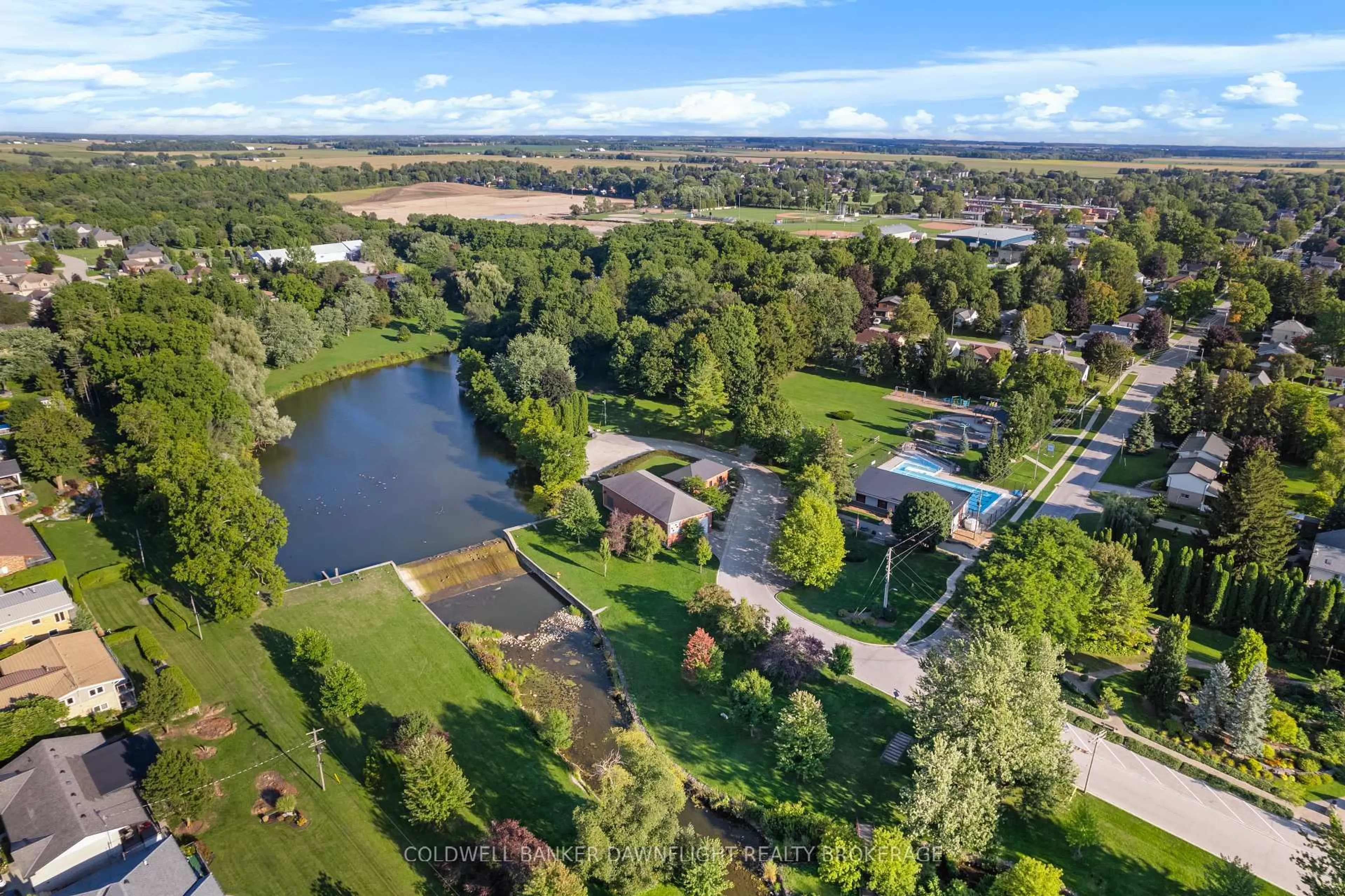 A pic from outside/outdoor area/front of a property/back of a property/a pic from drone, water/lake/river/ocean view for 56 HILLCREST Dr, South Huron Ontario N0M 1S3
