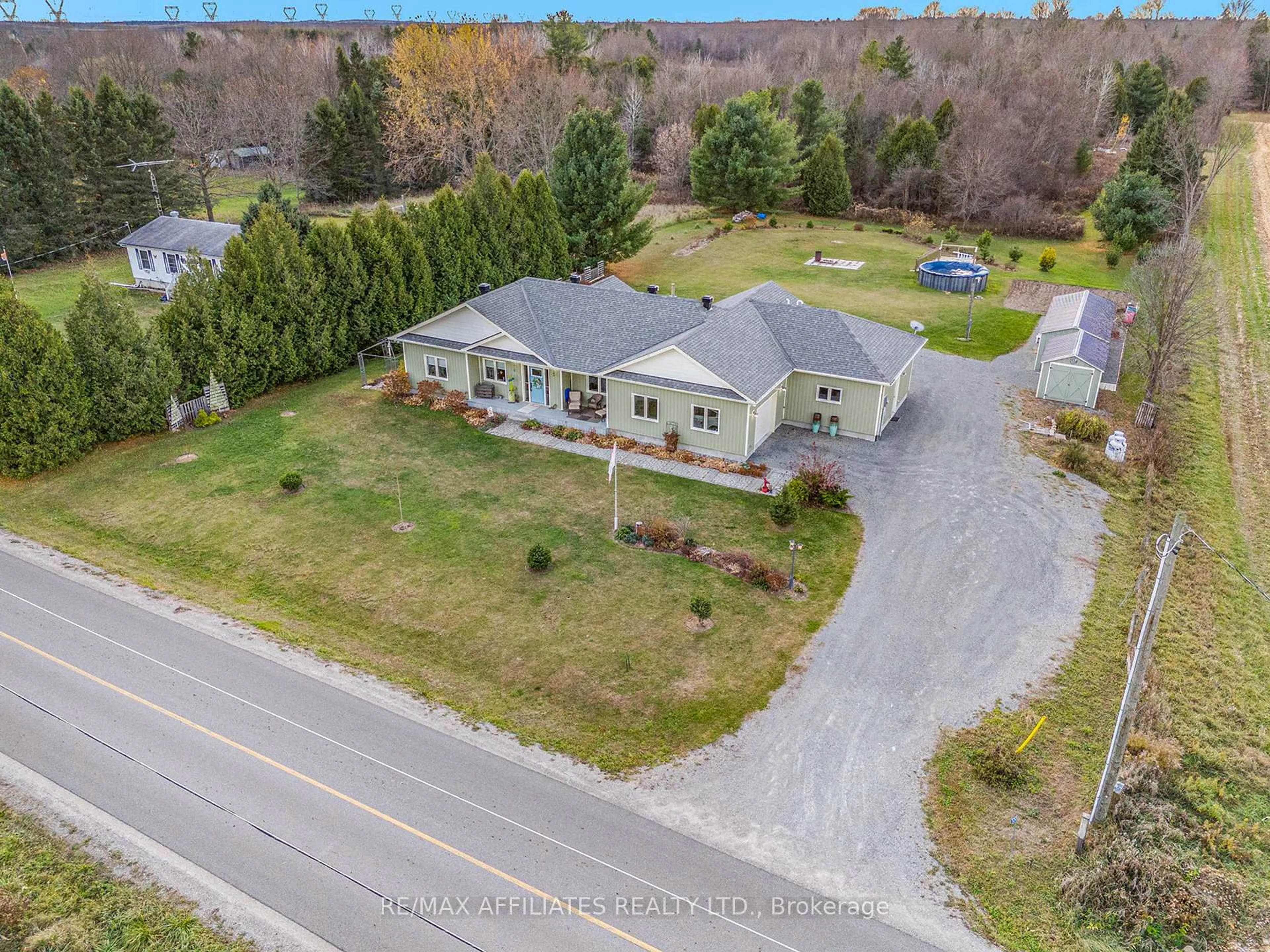 A pic from outside/outdoor area/front of a property/back of a property/a pic from drone, street for 100 SUMMERS Rd, Rideau Lakes Ontario K0G 1E0
