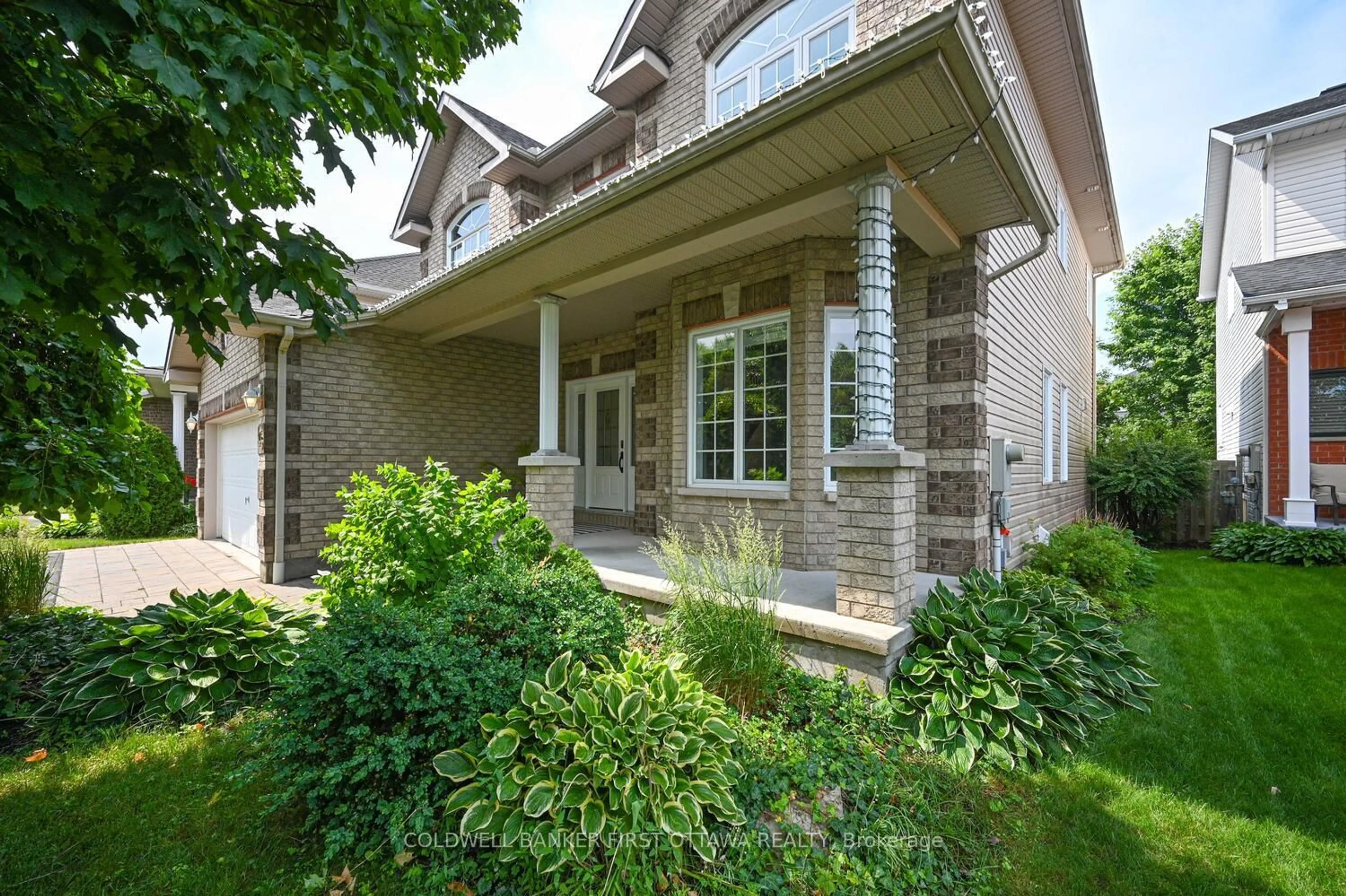 Home with brick exterior material, street for 105 Sirocco Cres, Stittsville Ontario K2S 2C9