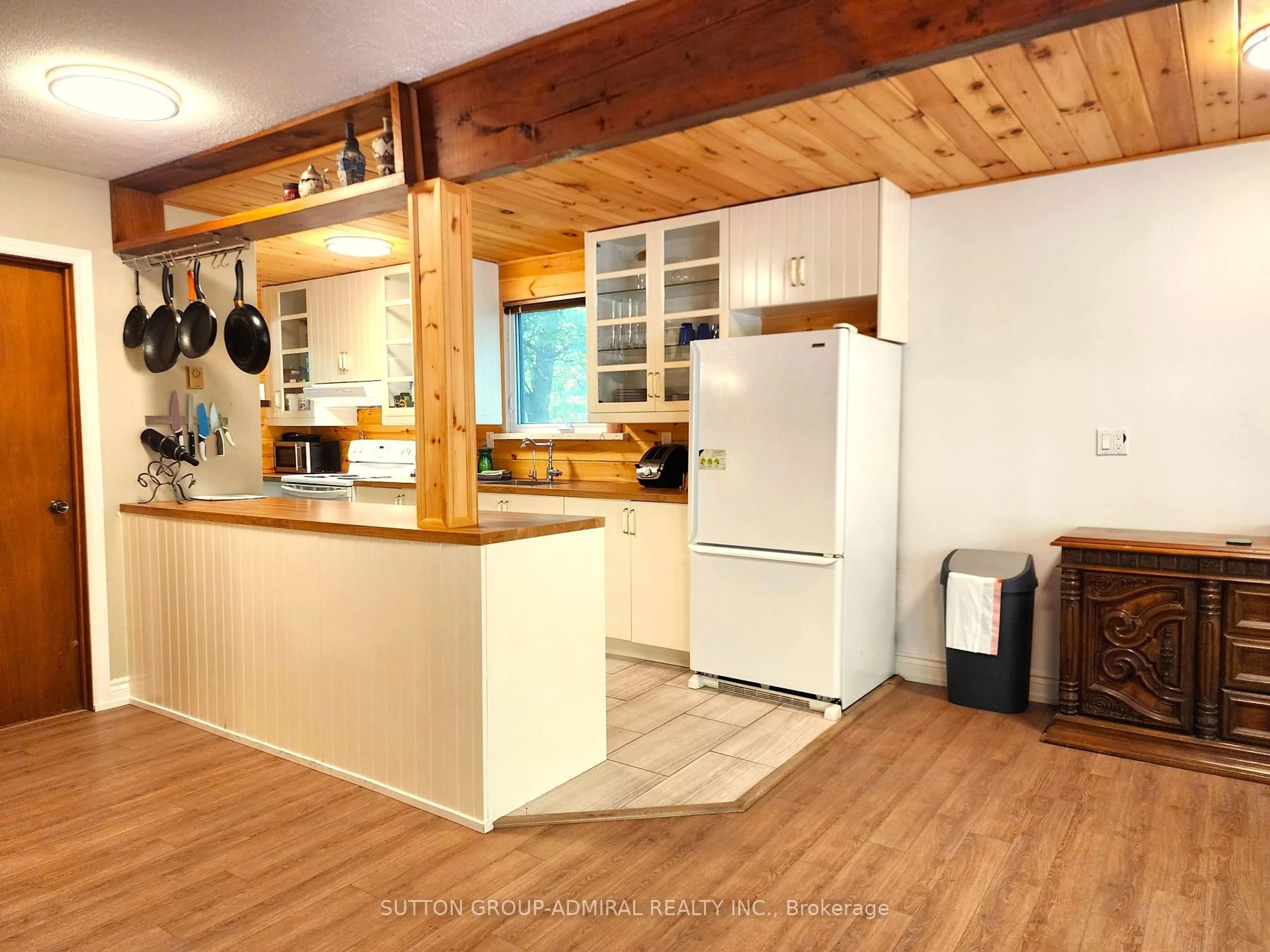 Open concept kitchen, wood/laminate floor for 525 Waltonian Dr, Nipissing Ontario P0H 1H0