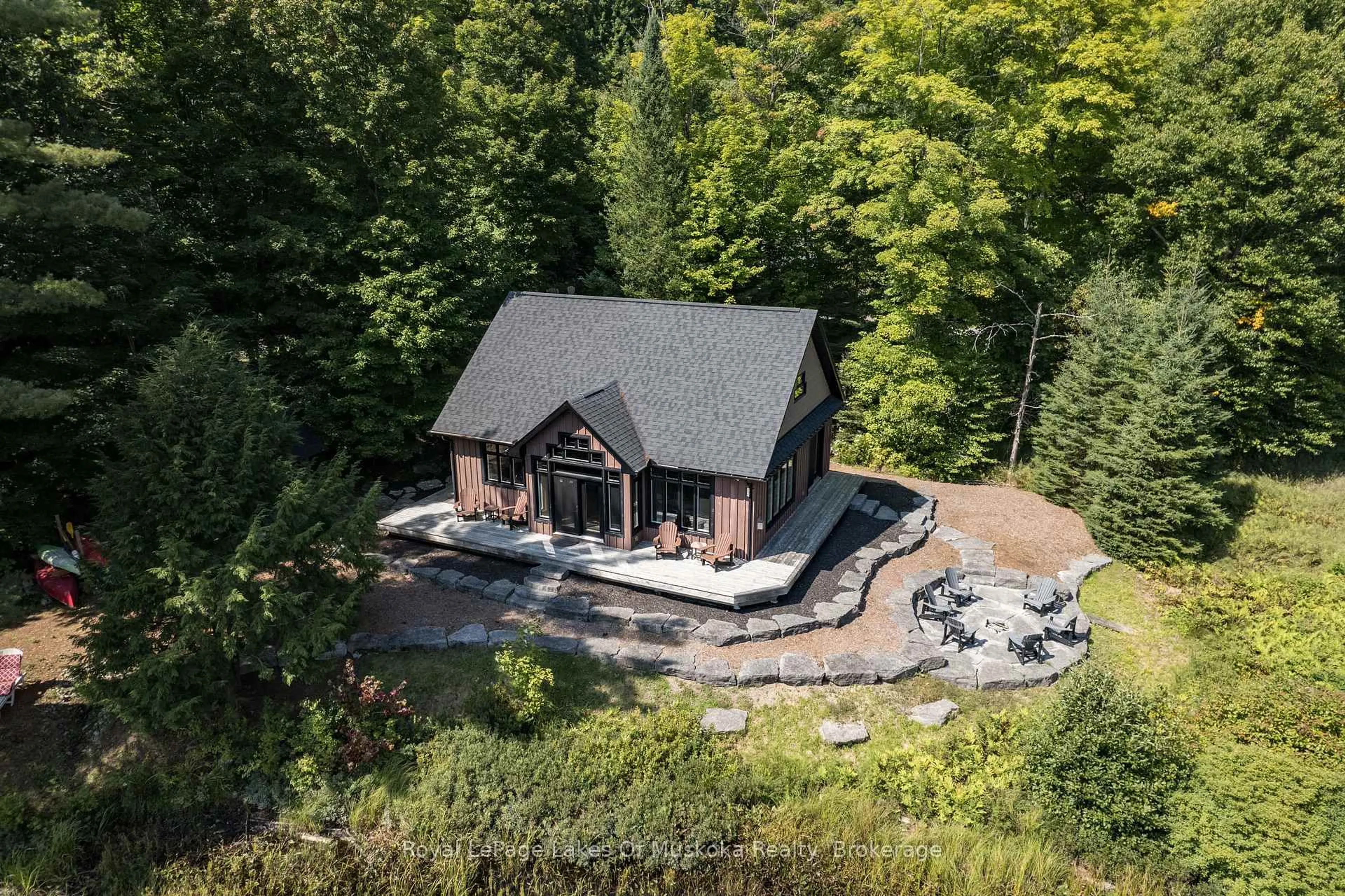 A pic from outside/outdoor area/front of a property/back of a property/a pic from drone, unknown for 195 CHARLIES Lane, Huntsville Ontario P0B 1M0