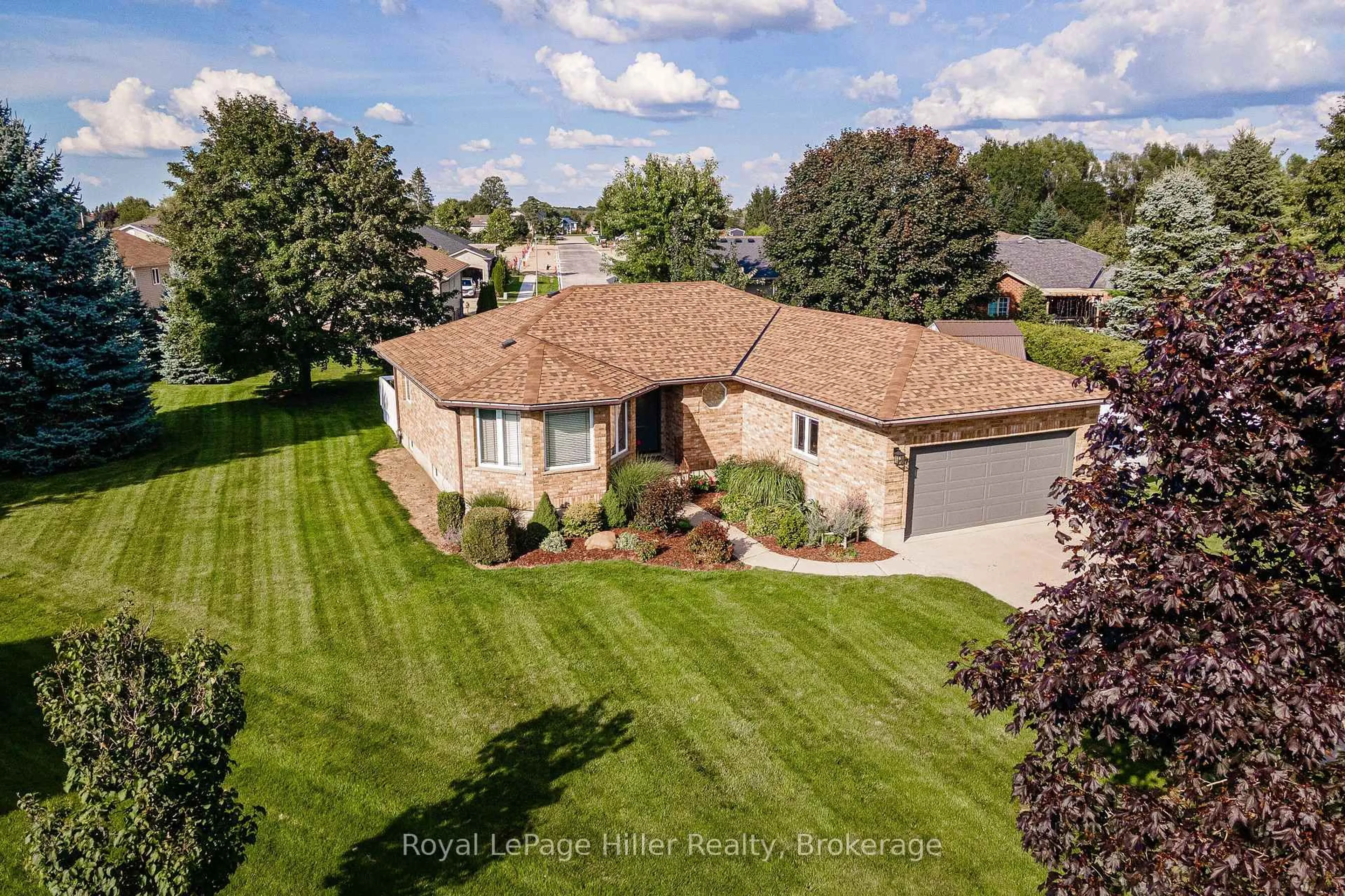 A pic from outside/outdoor area/front of a property/back of a property/a pic from drone, unknown for 177 Blenheim Crt, West Perth Ontario N0K 1N0
