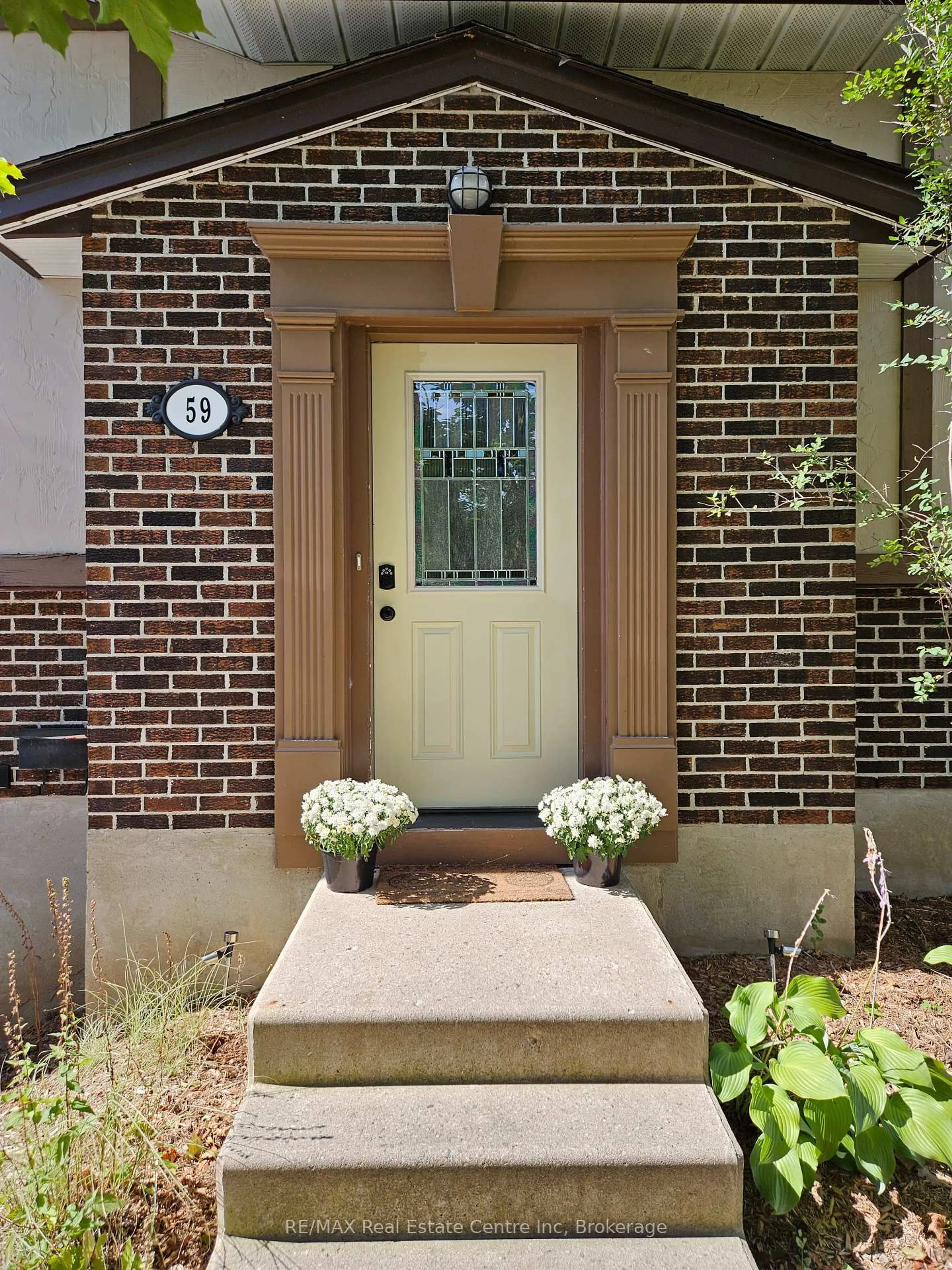 Home with brick exterior material, street for 59 Steffler Dr, Guelph Ontario N1G 3L5