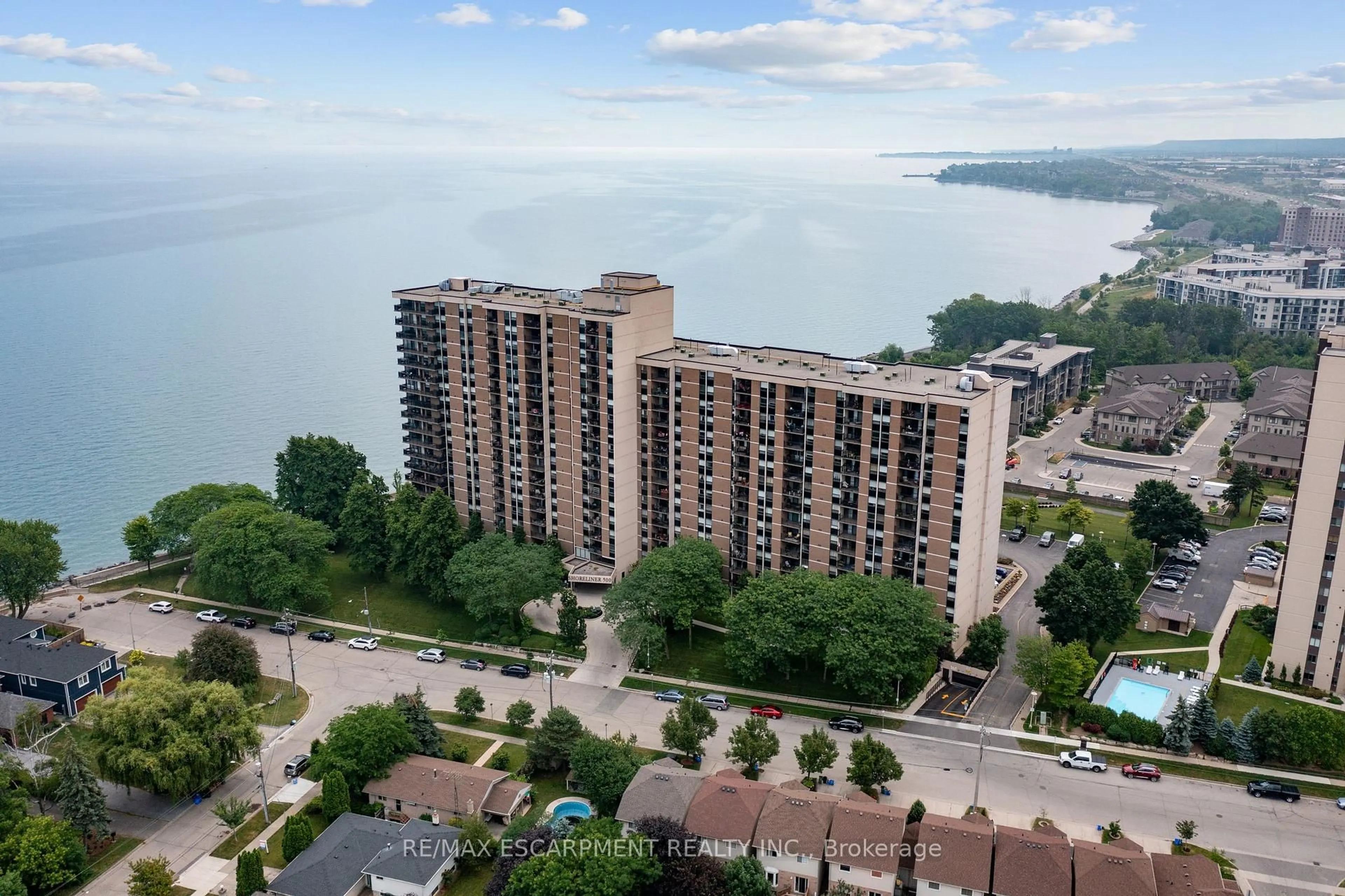 A pic from outside/outdoor area/front of a property/back of a property/a pic from drone, water/lake/river/ocean view for 500 GREEN Rd #218, Hamilton Ontario L8E 3M6