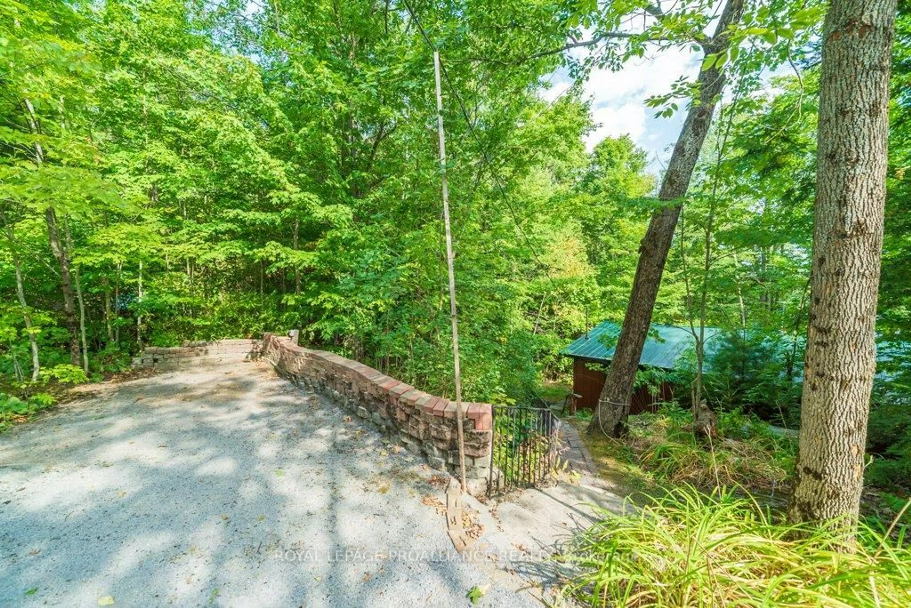 Patio, forest/trees view for 1228B South Pinnacle Point Lane, Arden Ontario K0H 1B0
